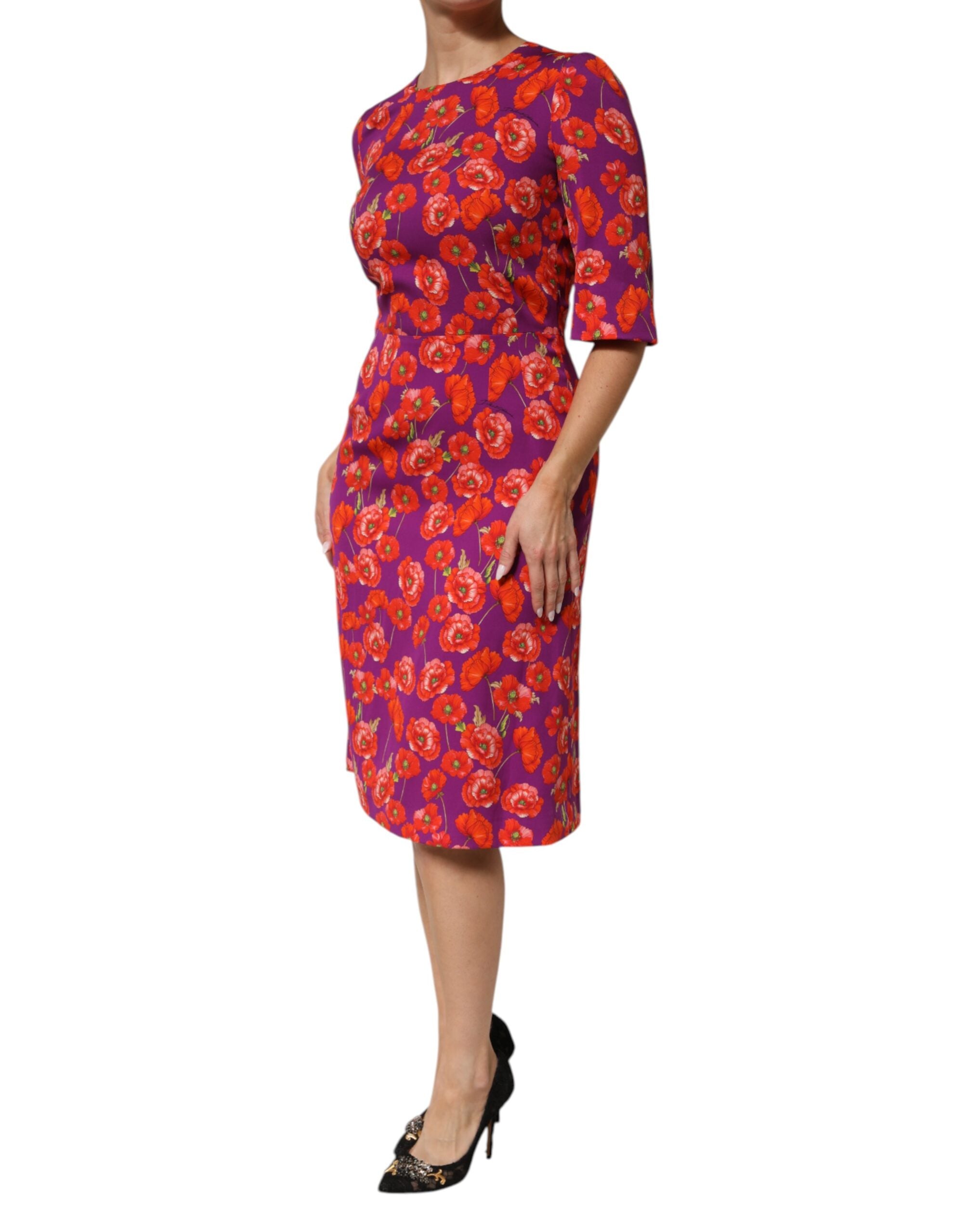 Experience the allure of Dolce & Gabbana's Purple Silk Floral Print Midi Sheath Dress, a masterpiece of exquisite Italian craftsmanship that embodies luxury and elegance.