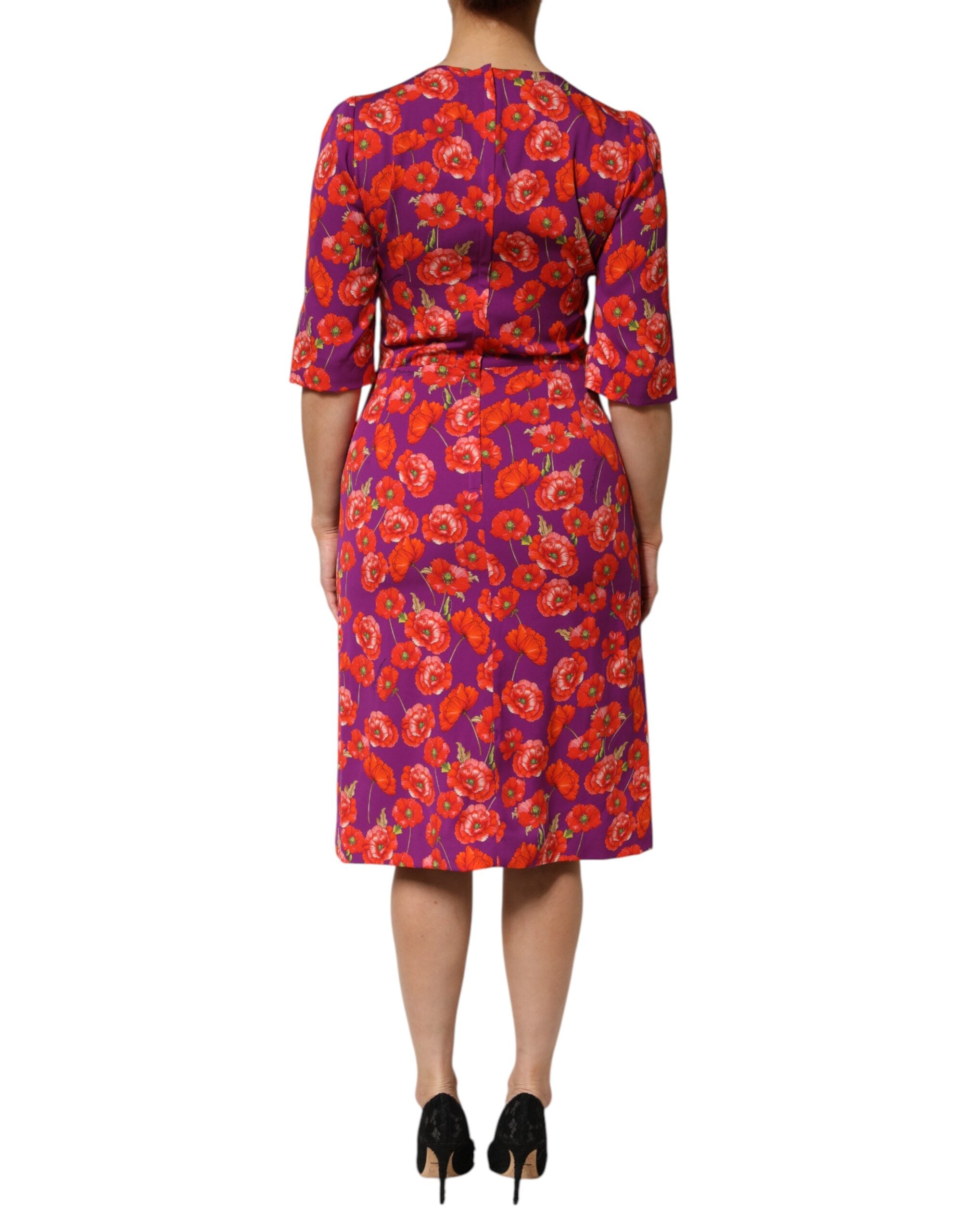 Discover the exquisite Dolce & Gabbana Purple Silk Floral Print Midi Sheath Dress, a luxurious embodiment of Italian craftsmanship and timeless elegance for any refined occasion.