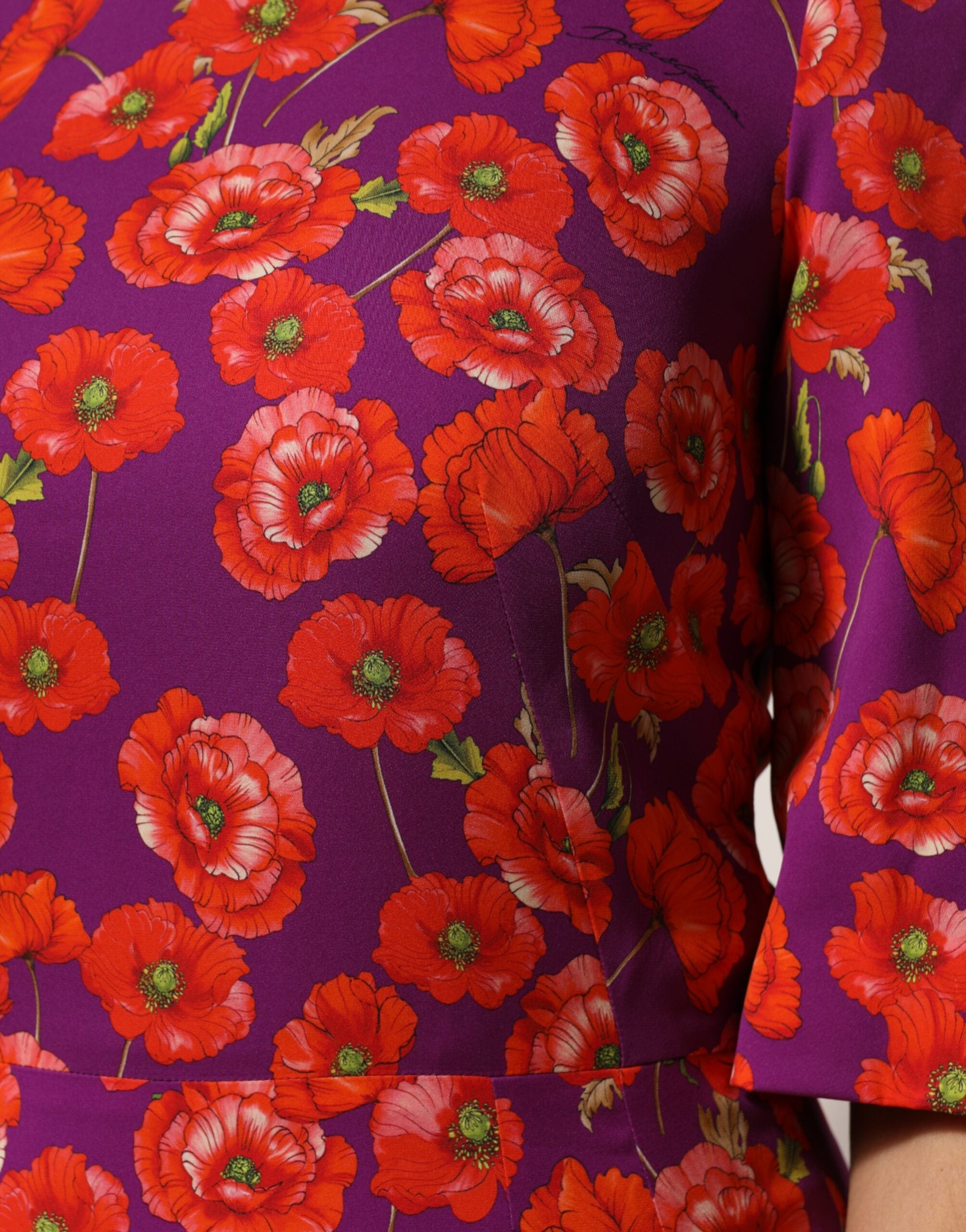 Discover the exquisite Dolce & Gabbana Purple Silk Floral Print Midi Sheath Dress, a timeless piece from the Couture Collection, embodying luxury and elegance for any refined occasion.