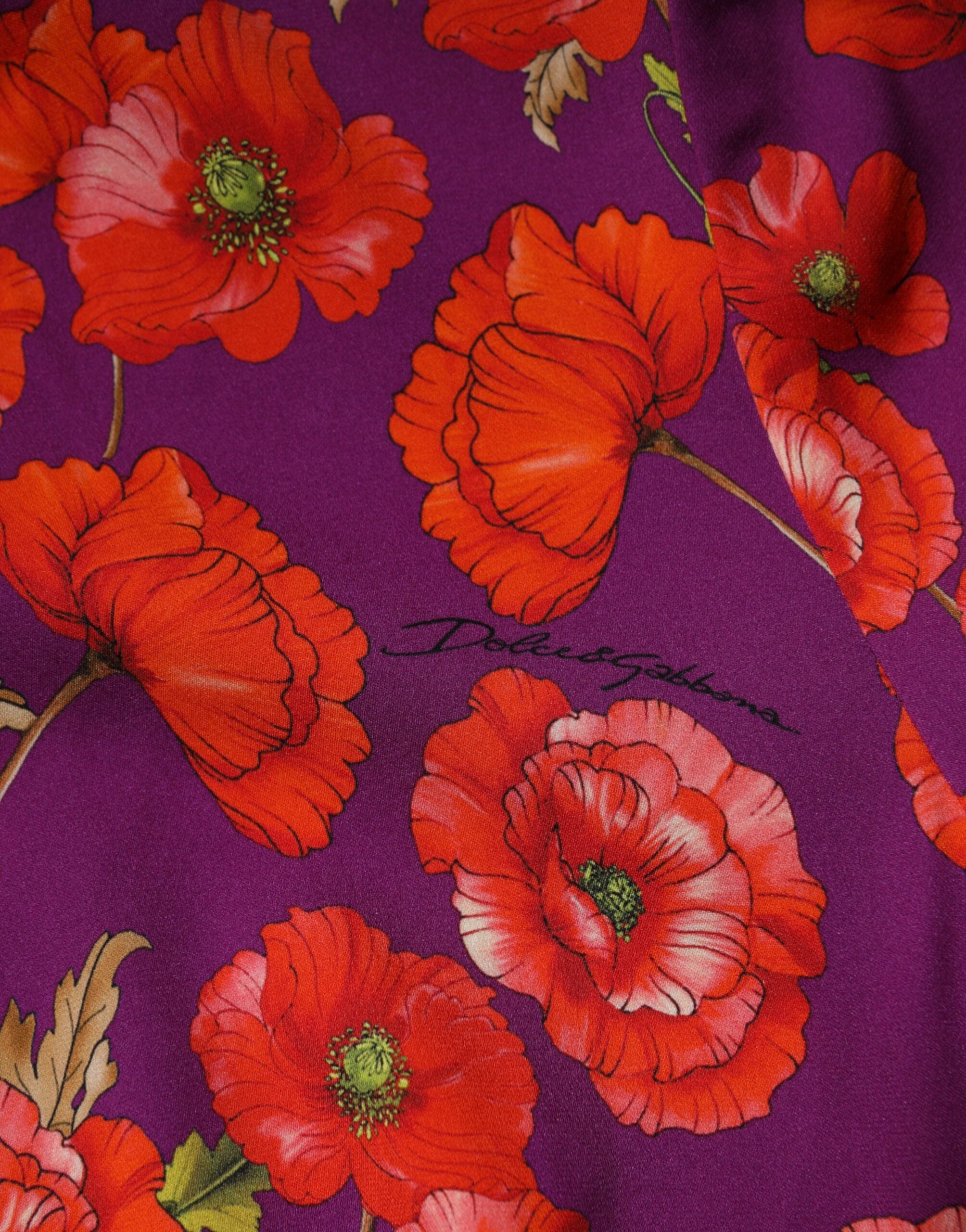 Discover the exquisite Dolce & Gabbana Purple Silk Floral Print Midi Sheath Dress, a luxurious embodiment of Italian craftsmanship that elevates any occasion with timeless elegance.