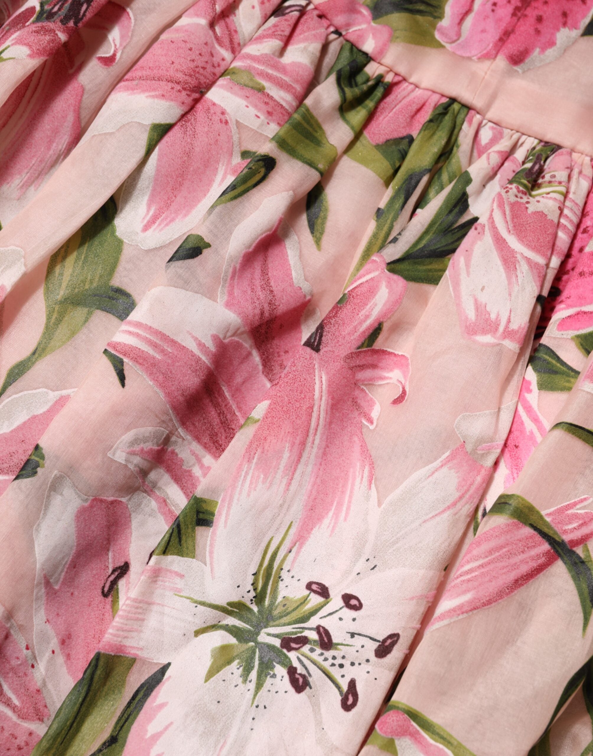 Elevate your elegance with the Dolce & Gabbana Pink Floral Lily Print Midi Dress, a masterpiece of luxurious silk and exquisite Italian craftsmanship, perfect for any sophisticated occasion.