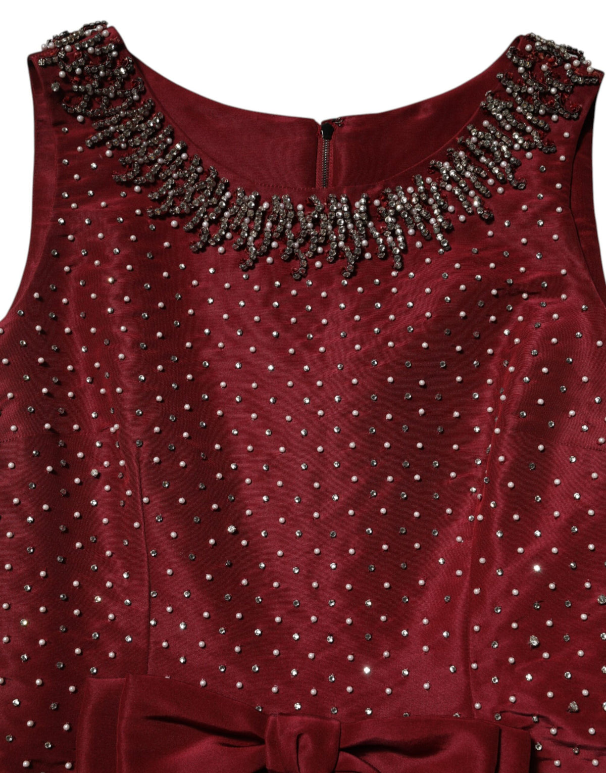 Experience the allure of the Dolce & Gabbana Burgundy Silk Beaded Evening Gown, a masterpiece of Italian craftsmanship that embodies elegance and sophistication for unforgettable moments.