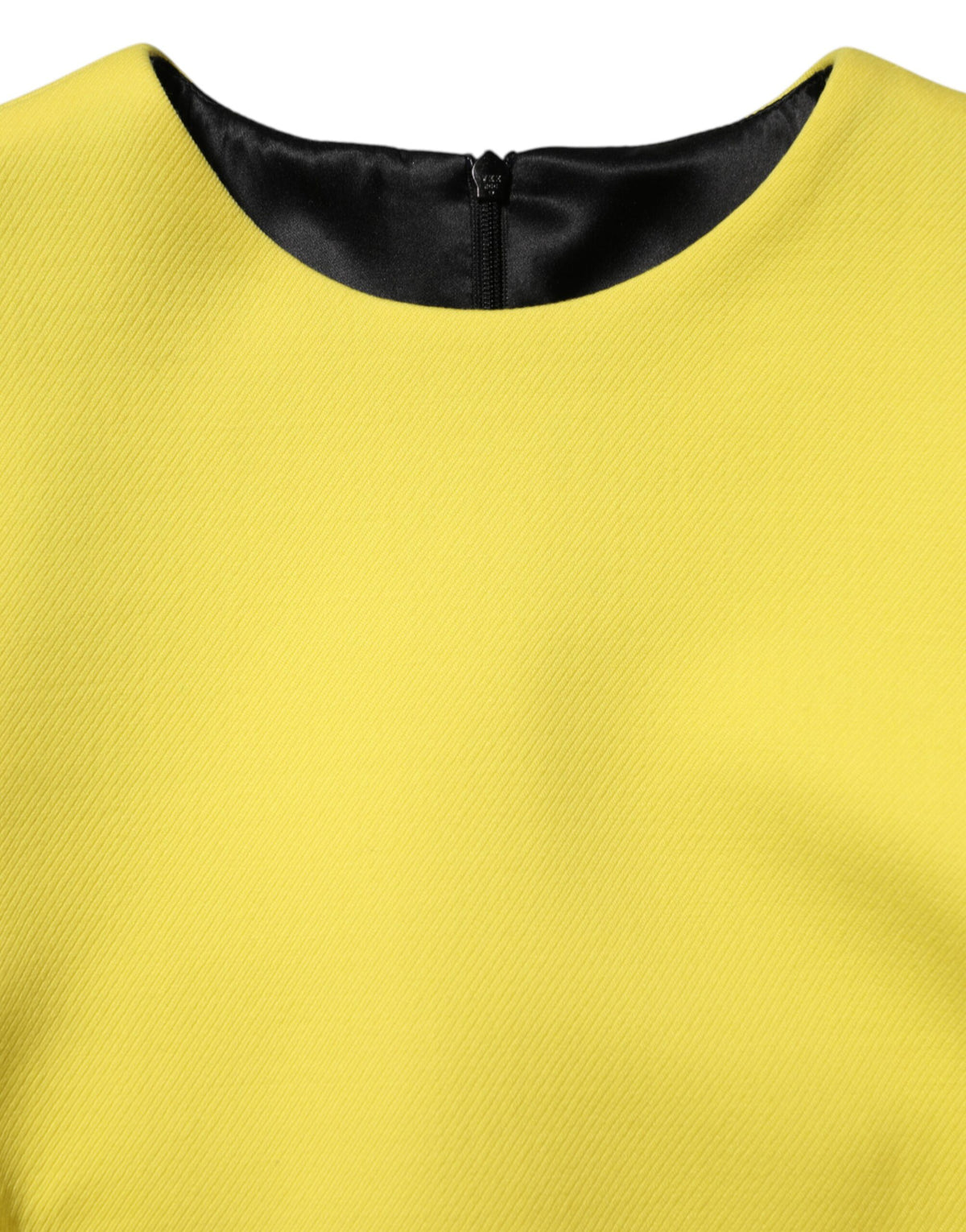 Indulge in the exquisite Dolce & Gabbana Yellow Viscose Acetate Mini Long Sleeve Dress, a timeless statement of elegance and luxury, crafted in Italy for the discerning individual.