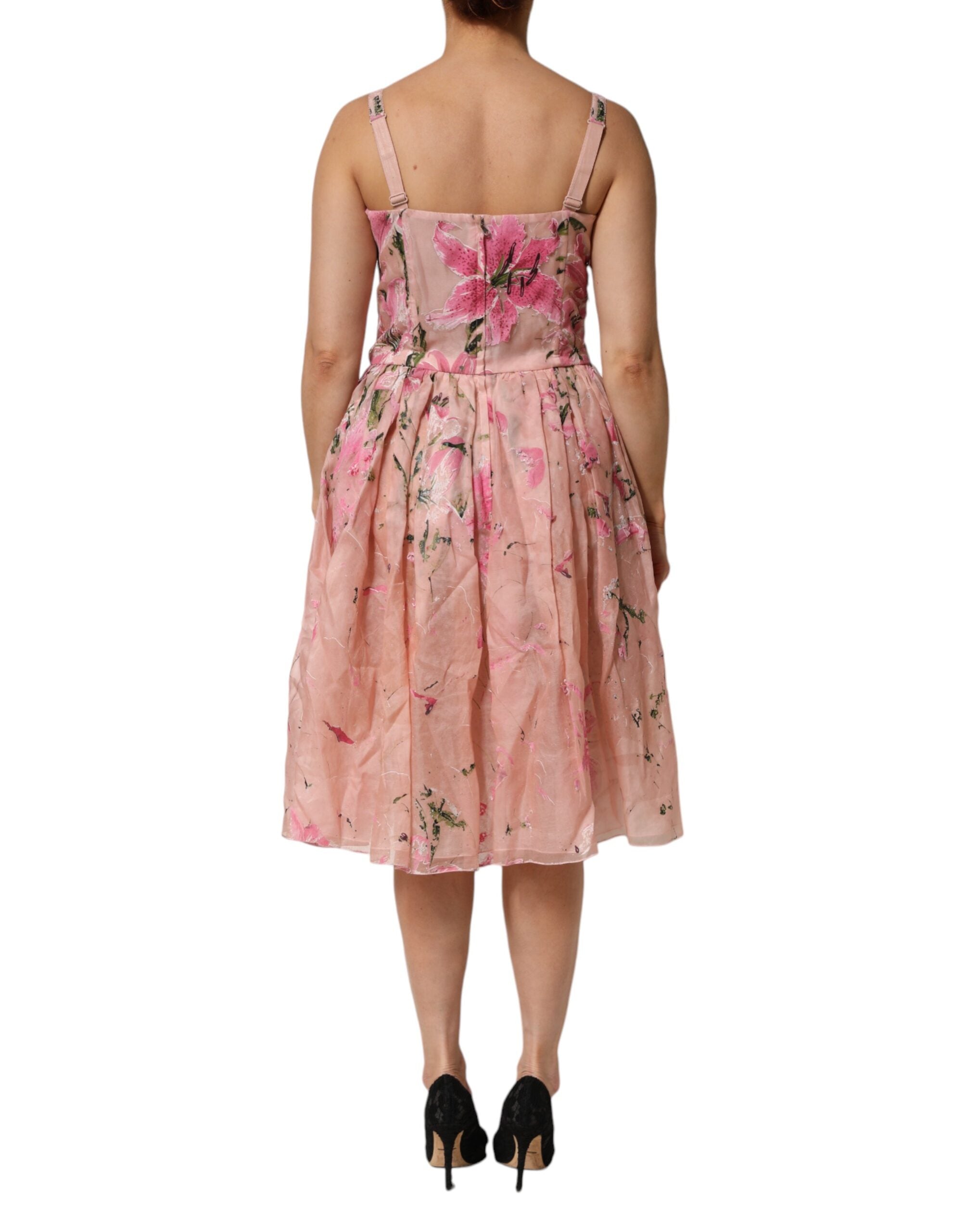 Experience the allure of the Dolce & Gabbana Pink Cotton Floral Pleated Sleeveless Dress, a masterpiece of Italian craftsmanship, blending luxury and elegance for unforgettable moments.
