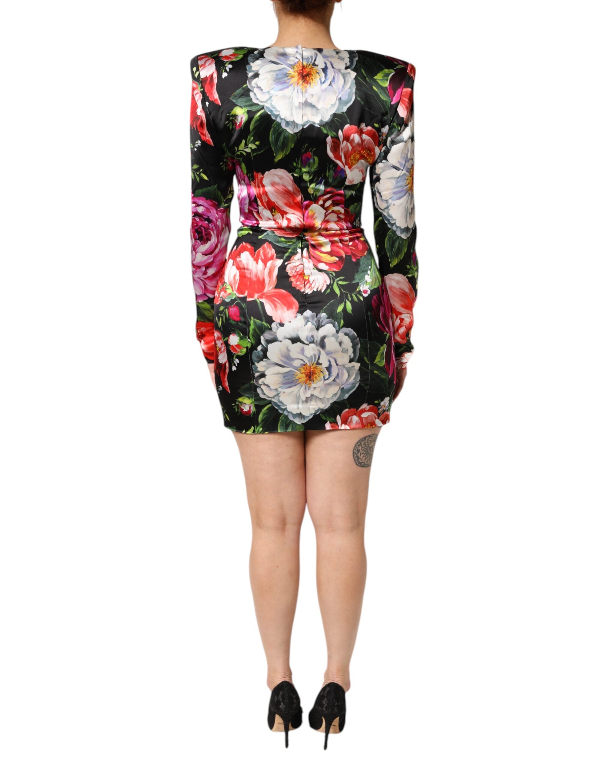 Indulge in the exquisite Dolce & Gabbana Black Floral Fiori Pittorici Mini Bodycon Dress, a masterpiece of Italian craftsmanship that elevates your style with luxurious materials and captivating allure.