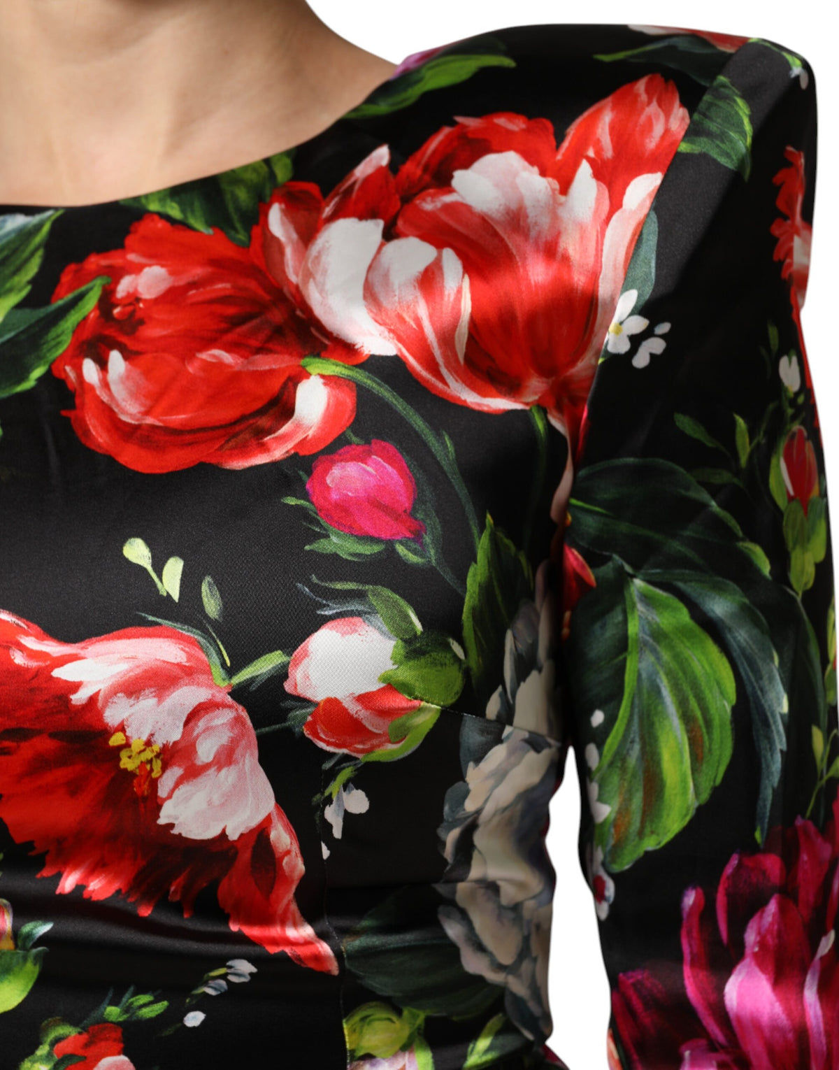 Indulge in the exquisite allure of the Dolce & Gabbana Black Floral Fiori Pittorici Mini Bodycon Dress, crafted from luxurious materials for a captivating, sophisticated silhouette.