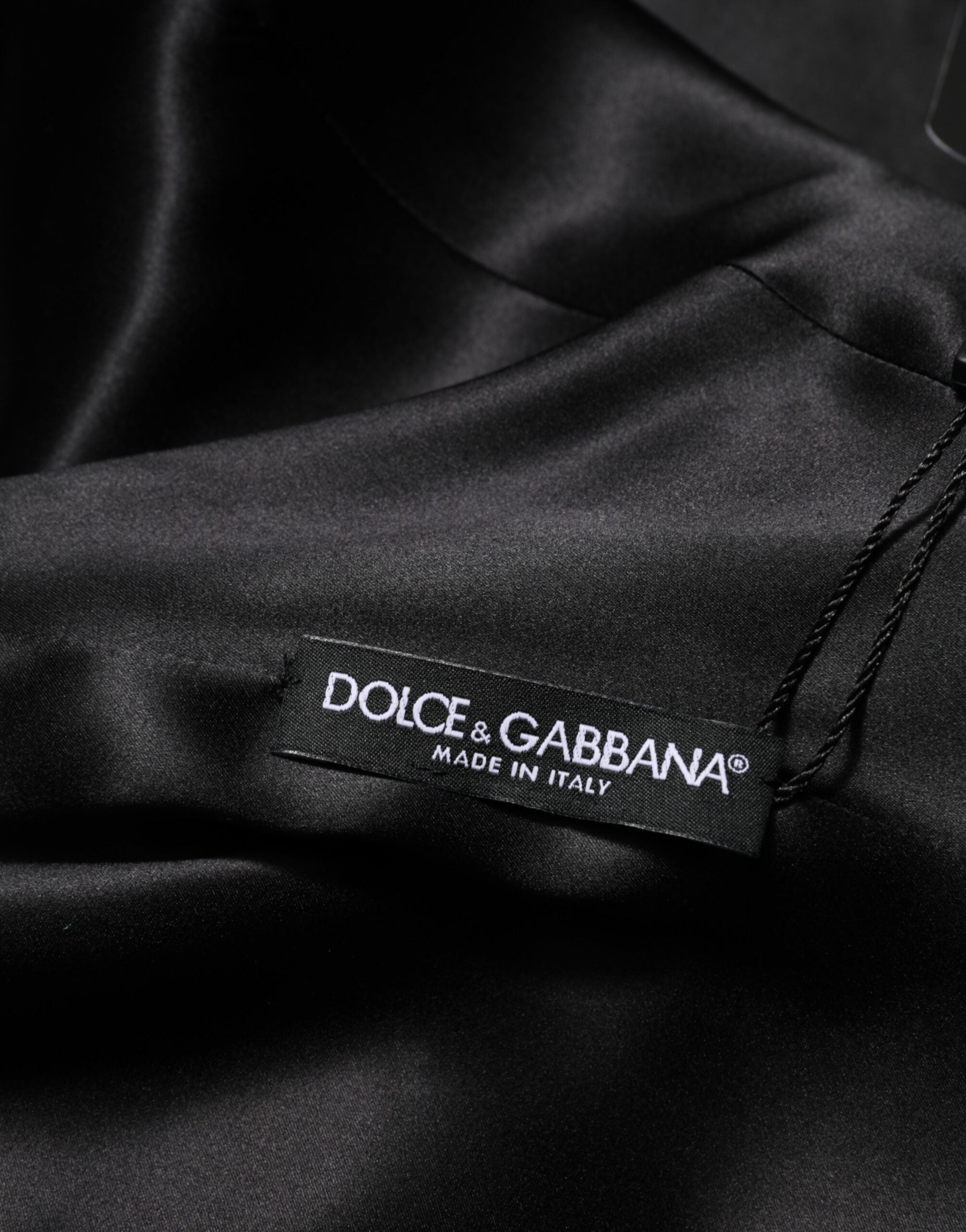 Discover the Dolce & Gabbana Green Viscose Acetate Mini Long Sleeve Dress, a masterpiece of Italian craftsmanship that embodies luxury and timeless elegance for the discerning individual.