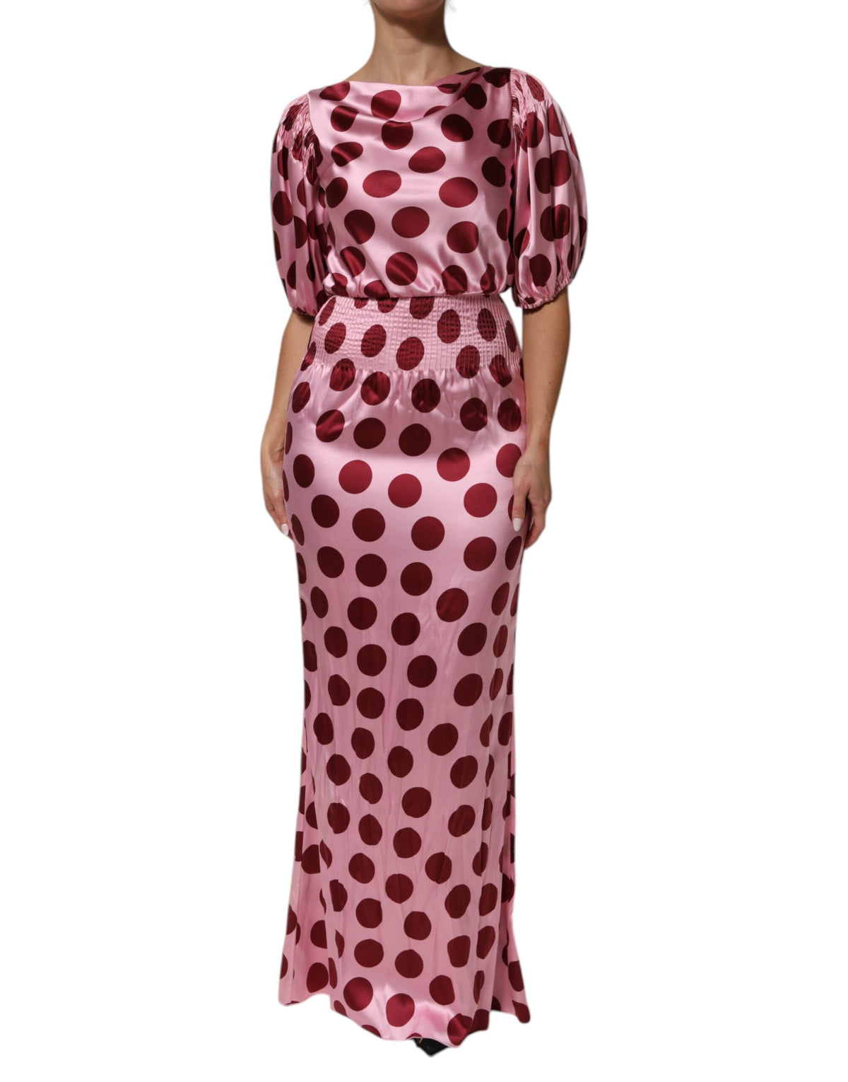 Indulge in the exquisite Dolce & Gabbana Pink Red Polka Dot Silk Satin Maxi Gown, a timeless masterpiece that embodies luxury, elegance, and effortless allure for unforgettable moments.