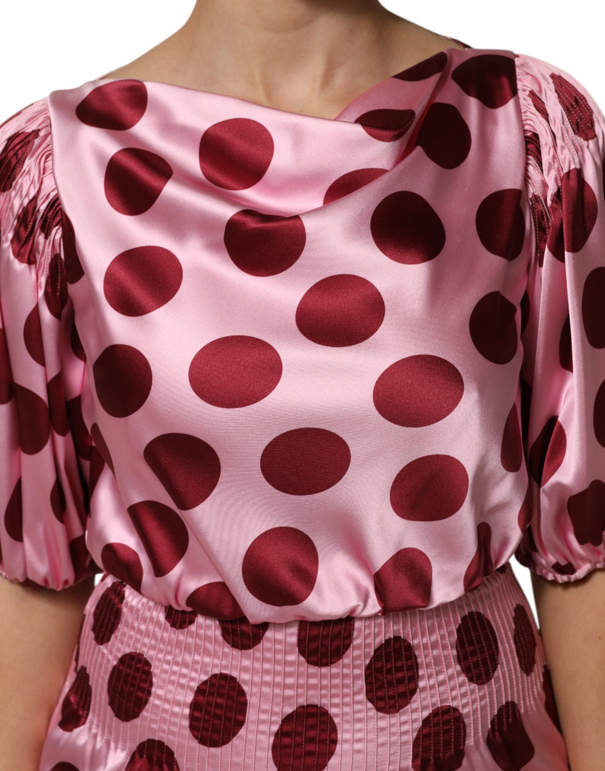 Indulge in the exquisite Dolce & Gabbana Pink Red Polka Dot Silk Satin Maxi Gown, a luxurious blend of silk and elastane, crafted for unforgettable elegance and allure.