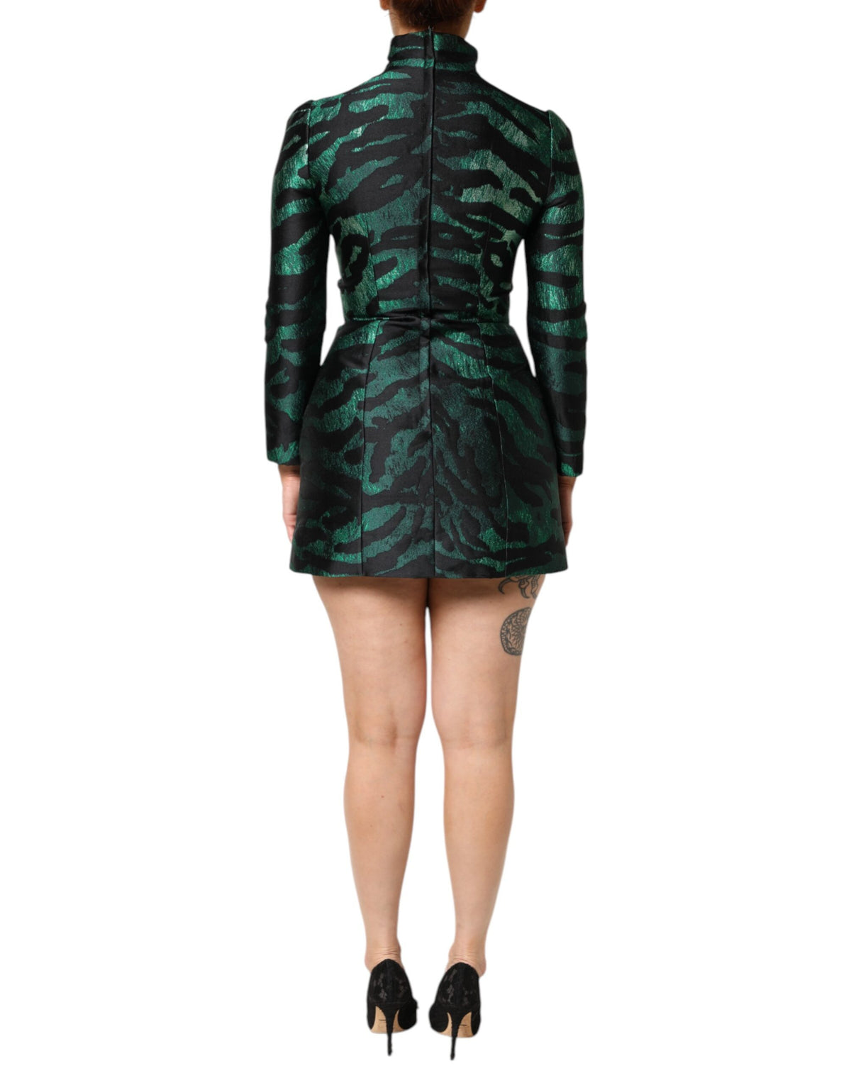 Indulge in the exquisite allure of the Dolce & Gabbana Black Green Metallic Jacquard Mini Long Dress, a testament to Italian craftsmanship and timeless elegance.