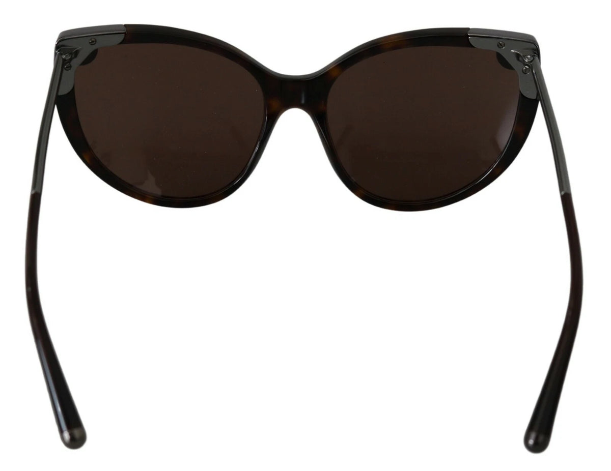 Indulge in the exquisite Dolce & Gabbana DG4337 Dark Havana Cat Eye Sunglasses, where timeless elegance meets artisanal craftsmanship for a luxurious lifestyle.