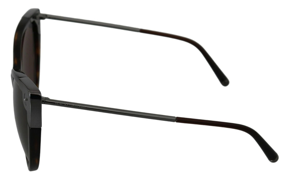 Experience the allure of Dolce & Gabbana DG4337 Dark Havana Cat Eye Sunglasses, where exquisite Italian craftsmanship meets timeless elegance for the discerning connoisseur.