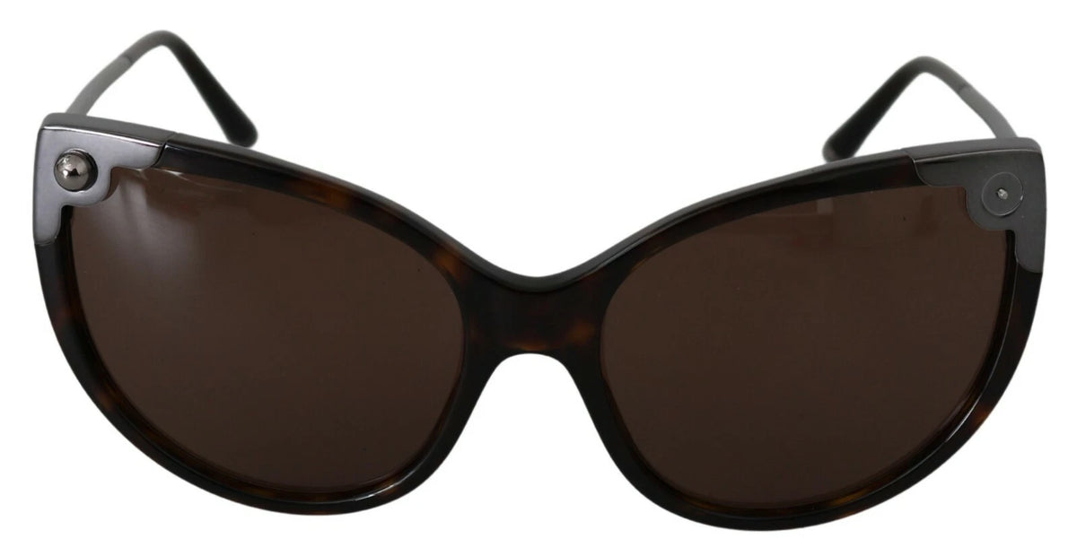 Indulge in the exquisite Dolce & Gabbana DG4337 Dark Havana Cat Eye Sunglasses, where timeless elegance meets artisanal craftsmanship for the discerning connoisseur.