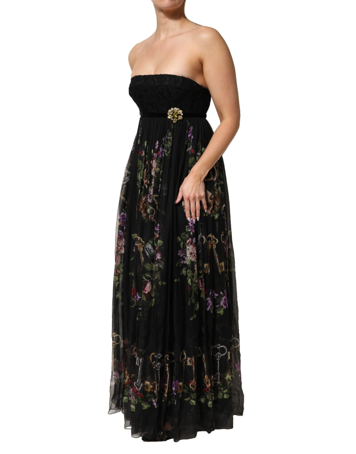 Indulge in the exquisite allure of the Dolce & Gabbana Black Floral Key Print Crystal Strapless Dress, where luxurious silk and crystal craftsmanship redefine elegance.