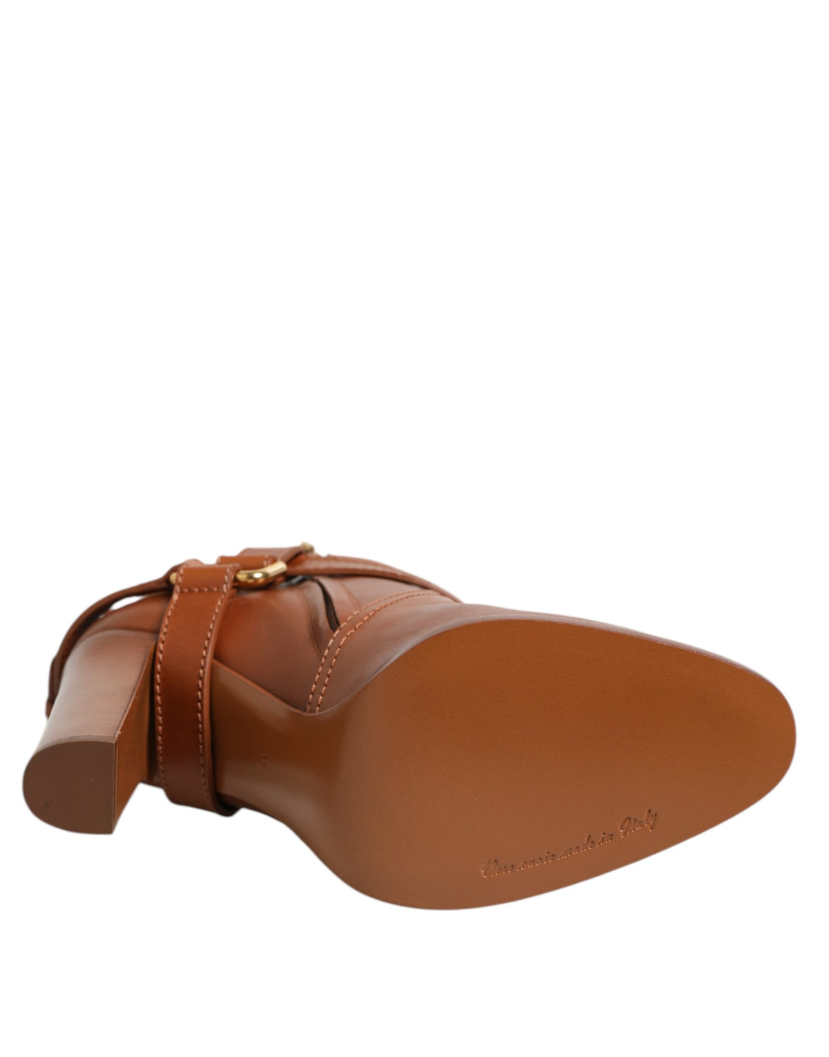 Indulge in the exquisite Dolce & Gabbana Brown Leather DG Logo Buckle Ankle Boots, a testament to unparalleled Italian craftsmanship and sophisticated elegance, perfect for elevating any ensemble.