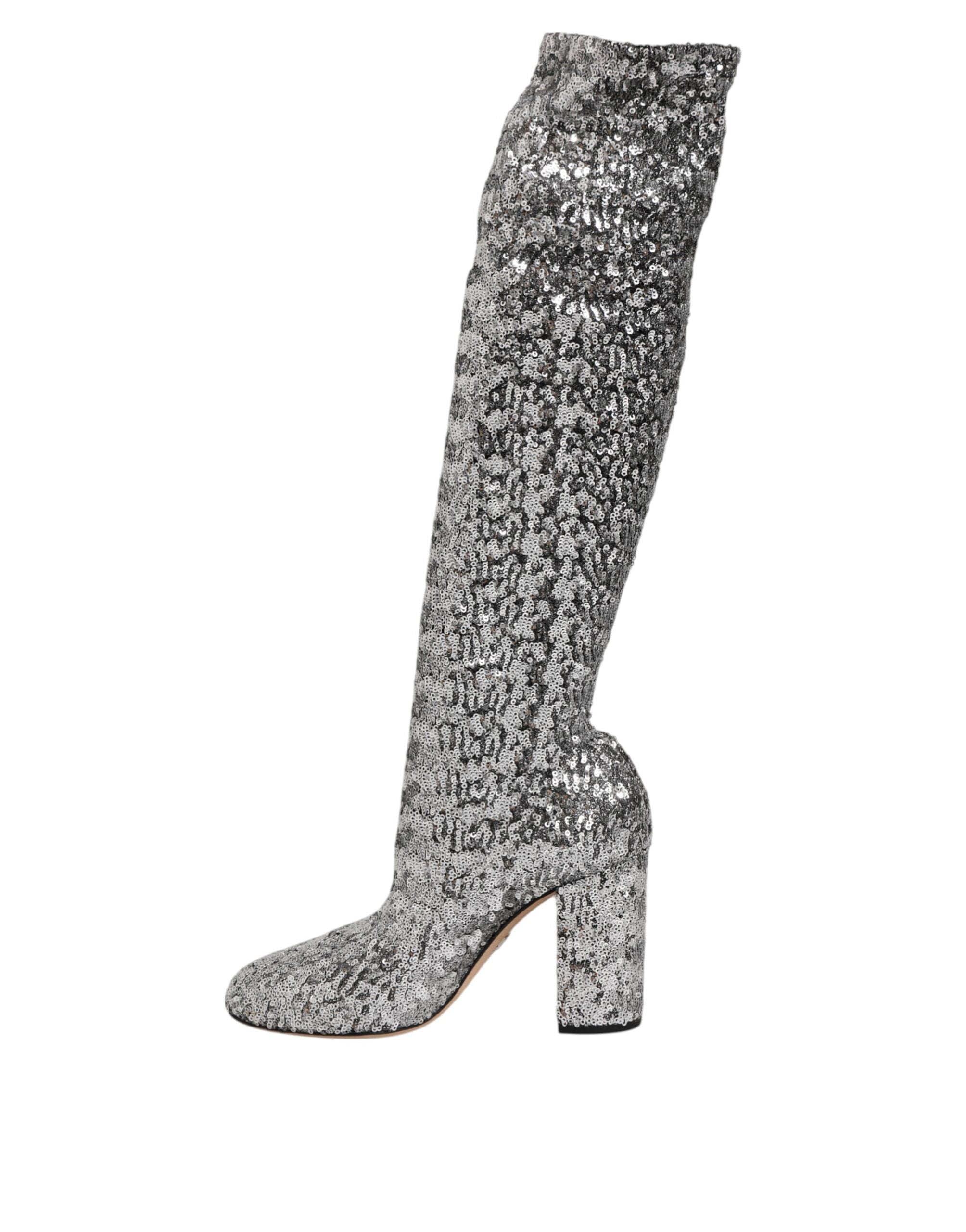 Experience the allure of Dolce & Gabbana's Silver Sequins High Heel Boot, a testament to Italian craftsmanship that elevates your style with luxurious elegance and sensuality.