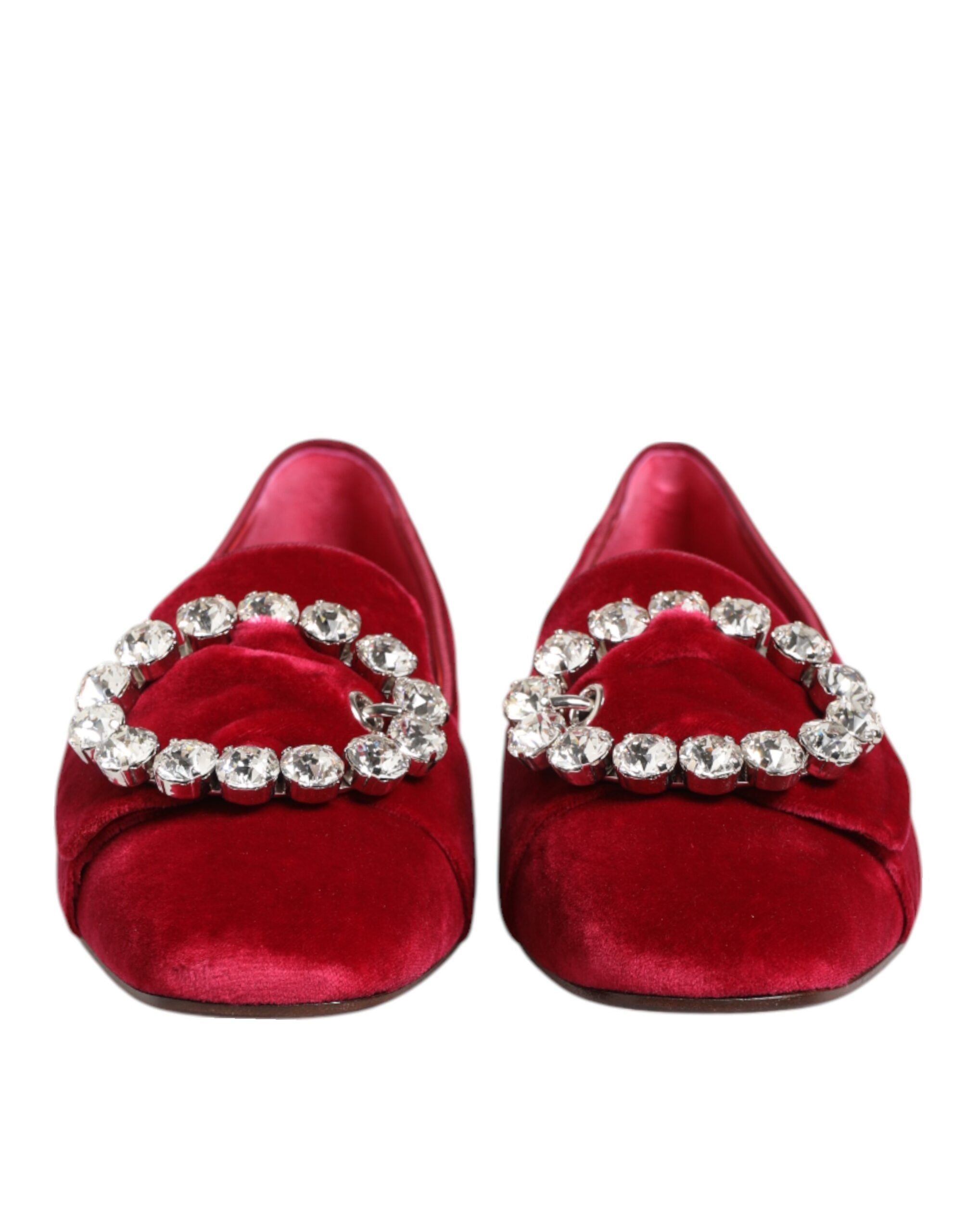 Indulge in the exquisite Dolce & Gabbana Red Velvet Crystal Buckle Loafers, where artisanal craftsmanship meets timeless elegance, perfect for the discerning connoisseur.
