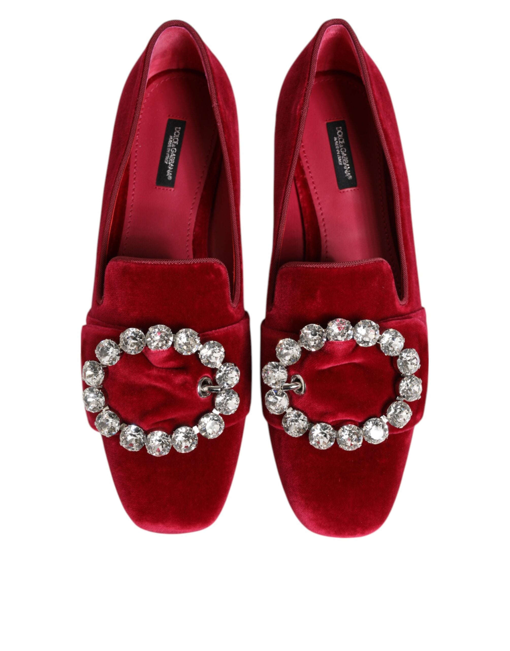 Step into the realm of sophistication with Dolce & Gabbana's Red Velvet Crystal Buckle Loafers, where artisanal craftsmanship meets timeless elegance, perfect for the discerning individual.