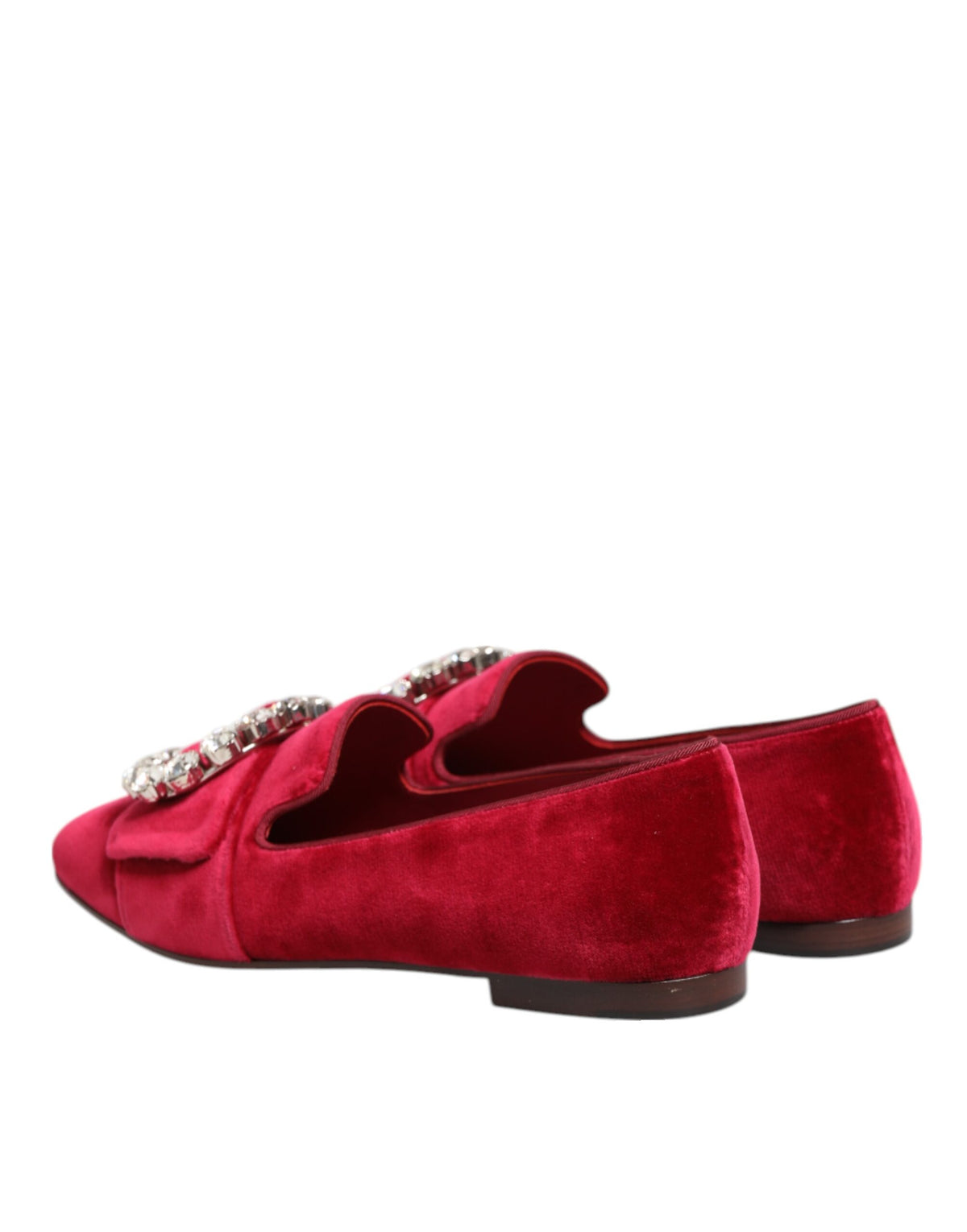 Indulge in the exquisite Dolce & Gabbana Red Velvet Crystal Buckle Loafers, handcrafted in Italy, where luxurious materials meet timeless elegance for the discerning individual.