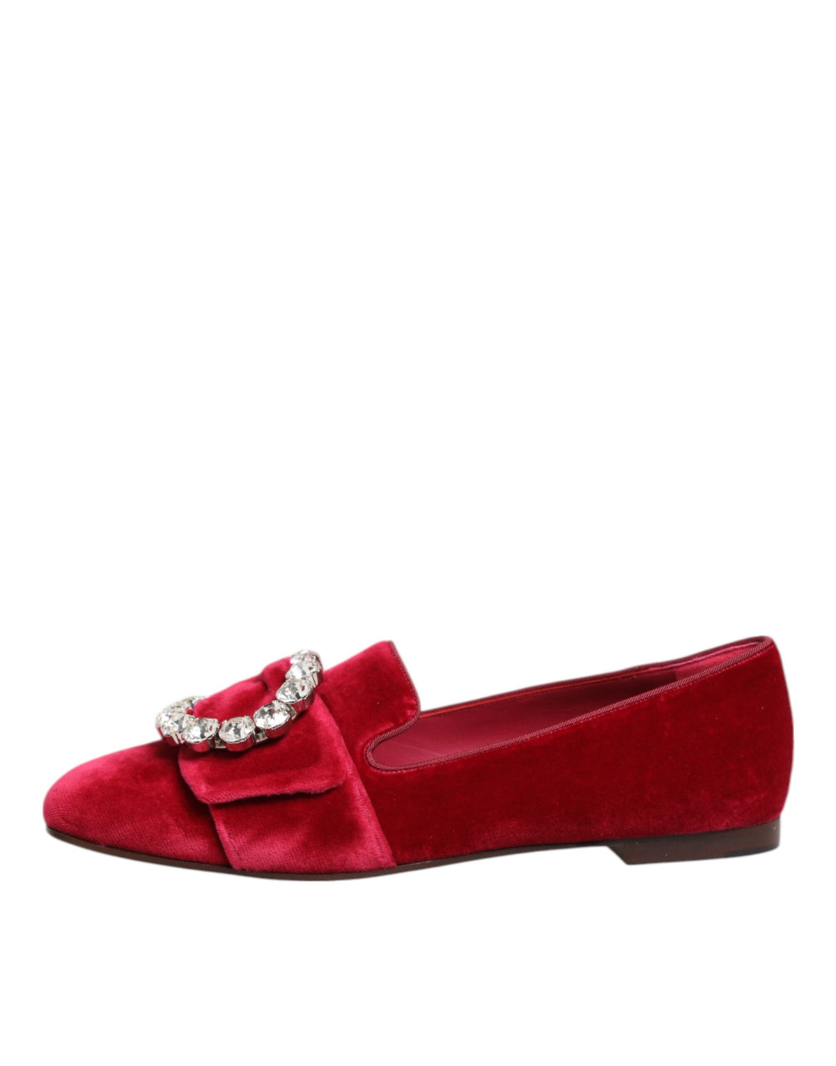 Indulge in the exquisite Dolce & Gabbana Red Velvet Crystal Buckle Loafers, where artisanal craftsmanship meets timeless elegance, perfect for the discerning connoisseur.