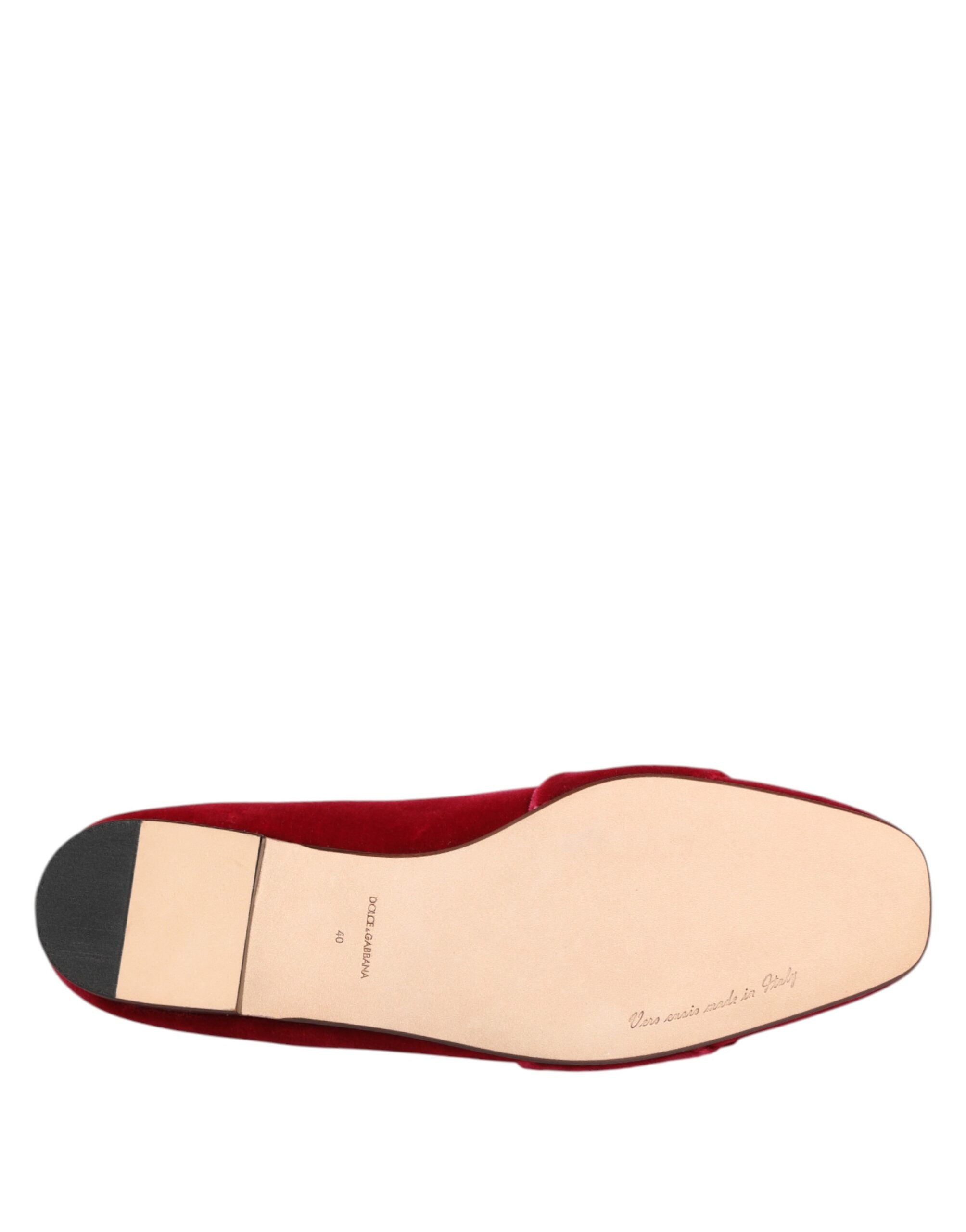 Indulge in the exquisite Dolce & Gabbana Red Velvet Crystal Buckle Loafers, where artisanal craftsmanship meets timeless elegance, perfect for the discerning connoisseur.