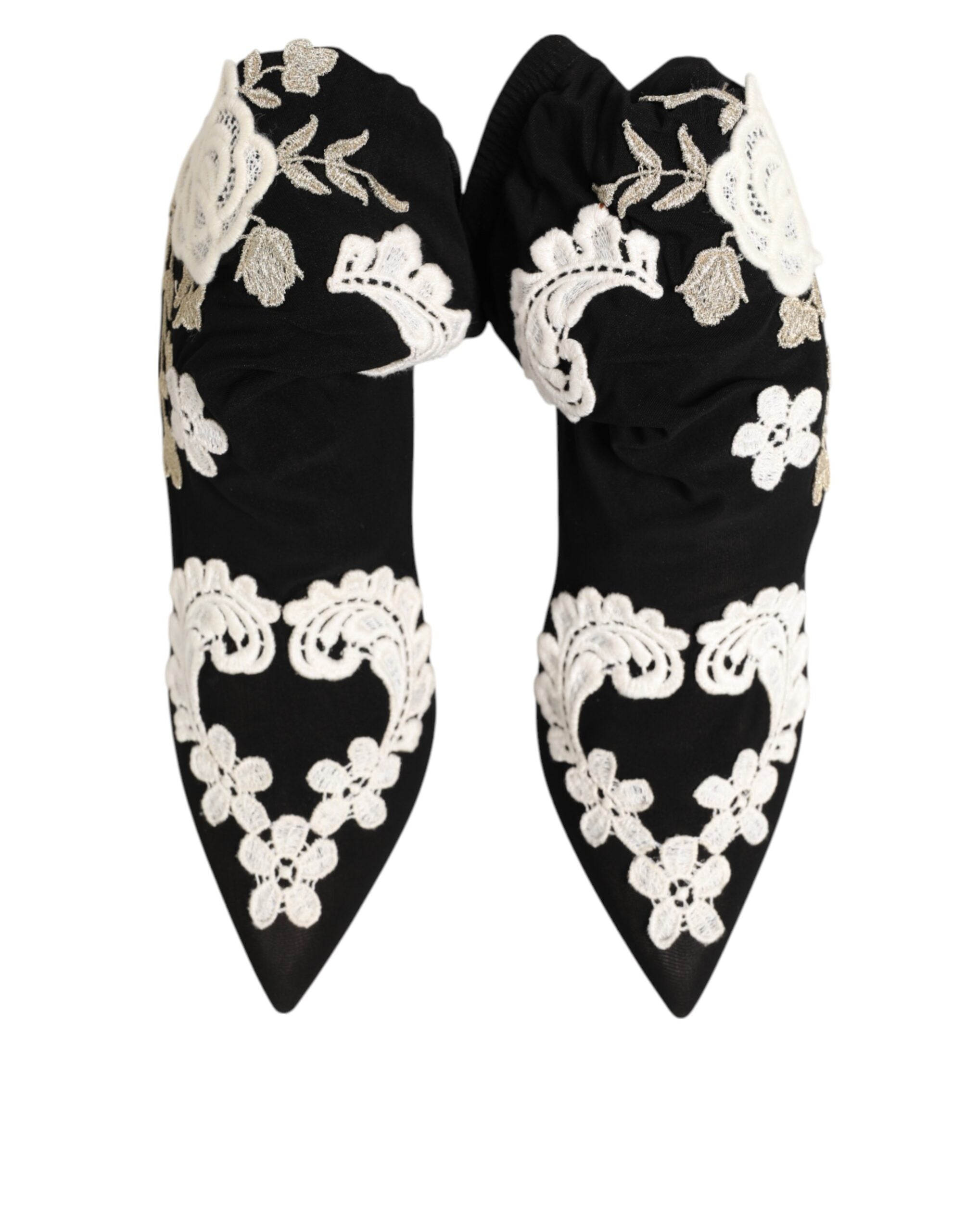 Elevate your style with Dolce & Gabbana's Black White Embroidered Jersey Stiletto Boots, where exquisite craftsmanship meets timeless elegance for the discerning fashionista.