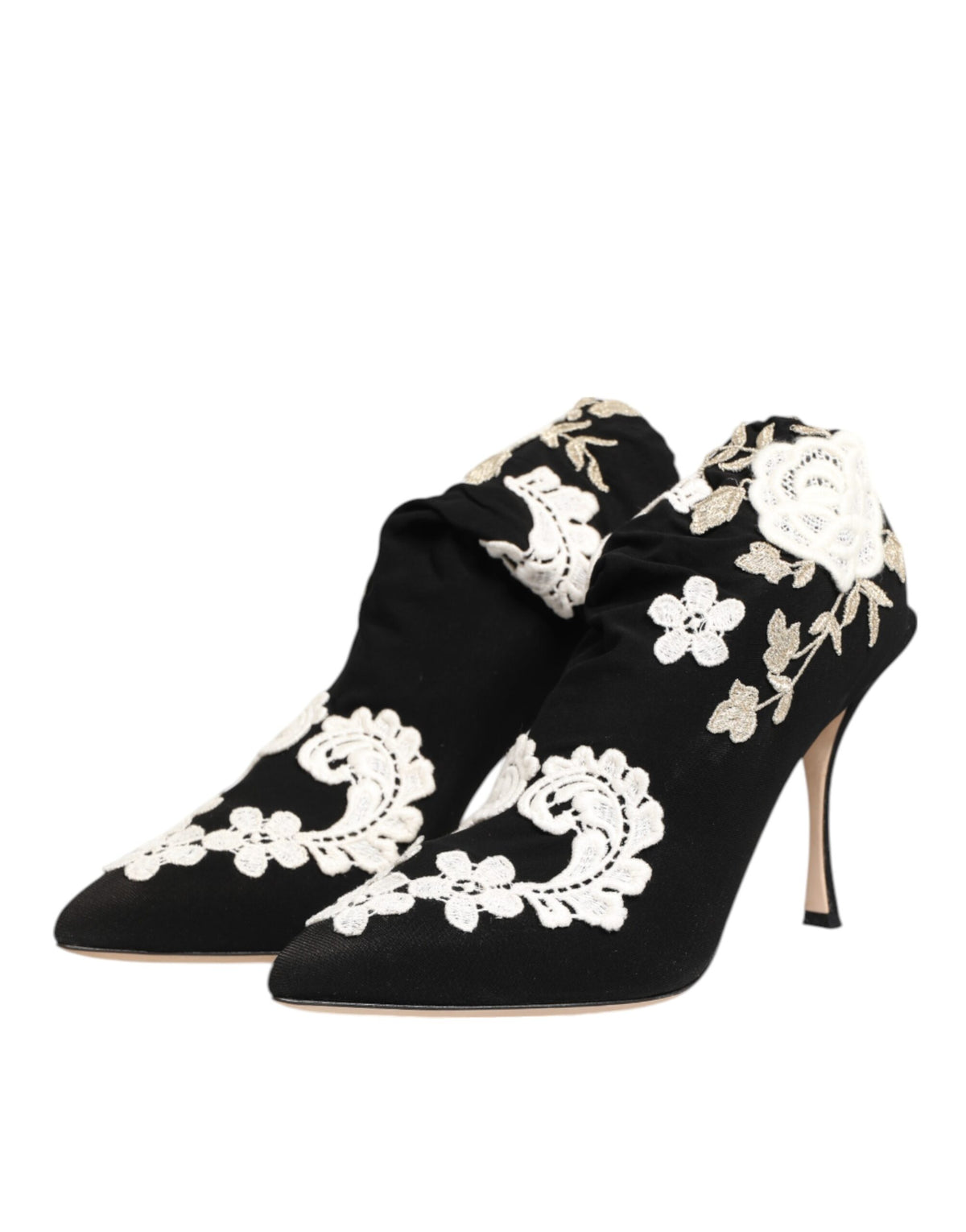 Step into unparalleled sophistication with Dolce & Gabbana's Black White Embroidered Jersey Stiletto Boots, where exquisite craftsmanship meets timeless allure.