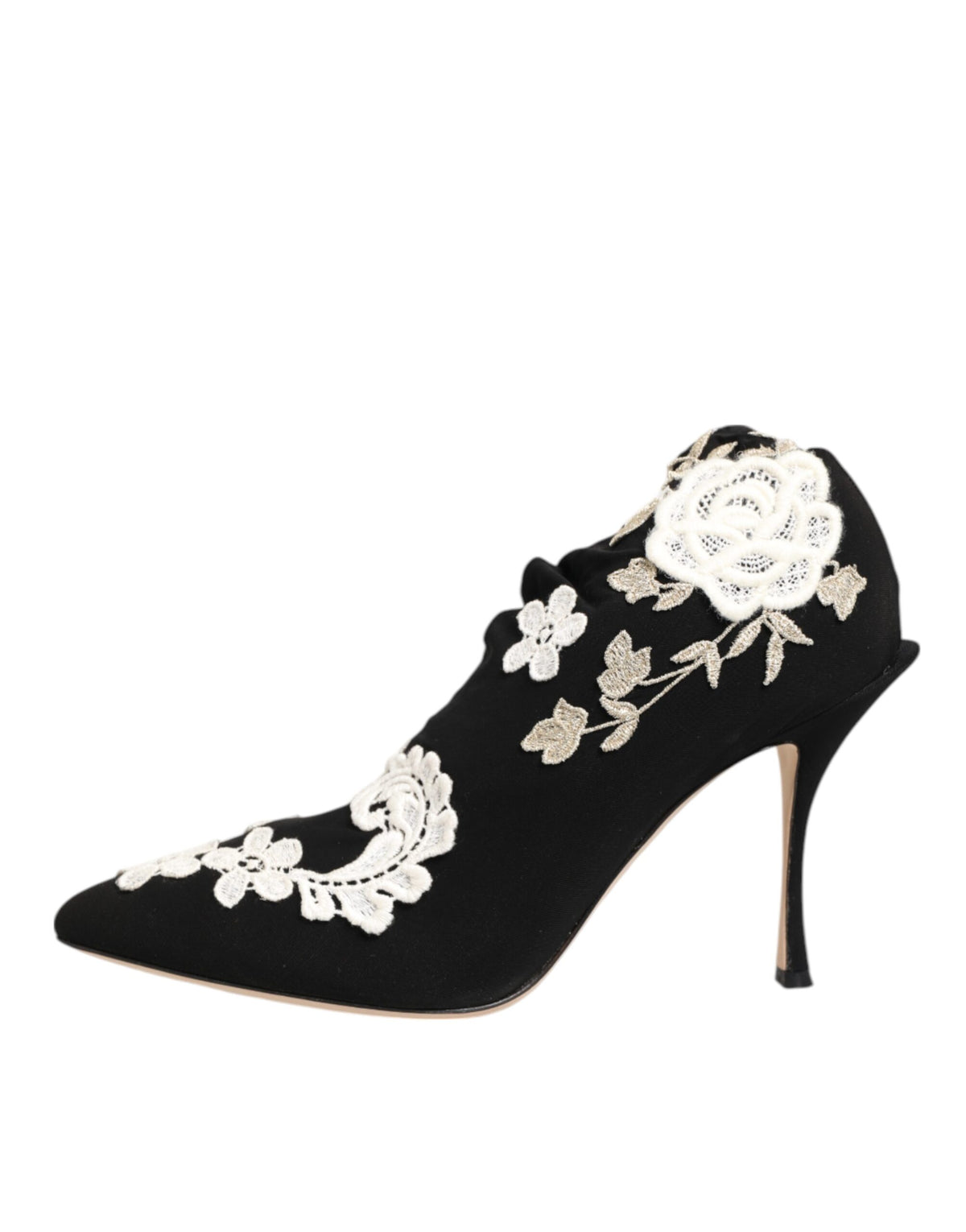 Step into elegance with Dolce & Gabbana's Black White Embroidered Jersey Stiletto Boots, where luxurious craftsmanship meets bold artistry for a timeless statement.