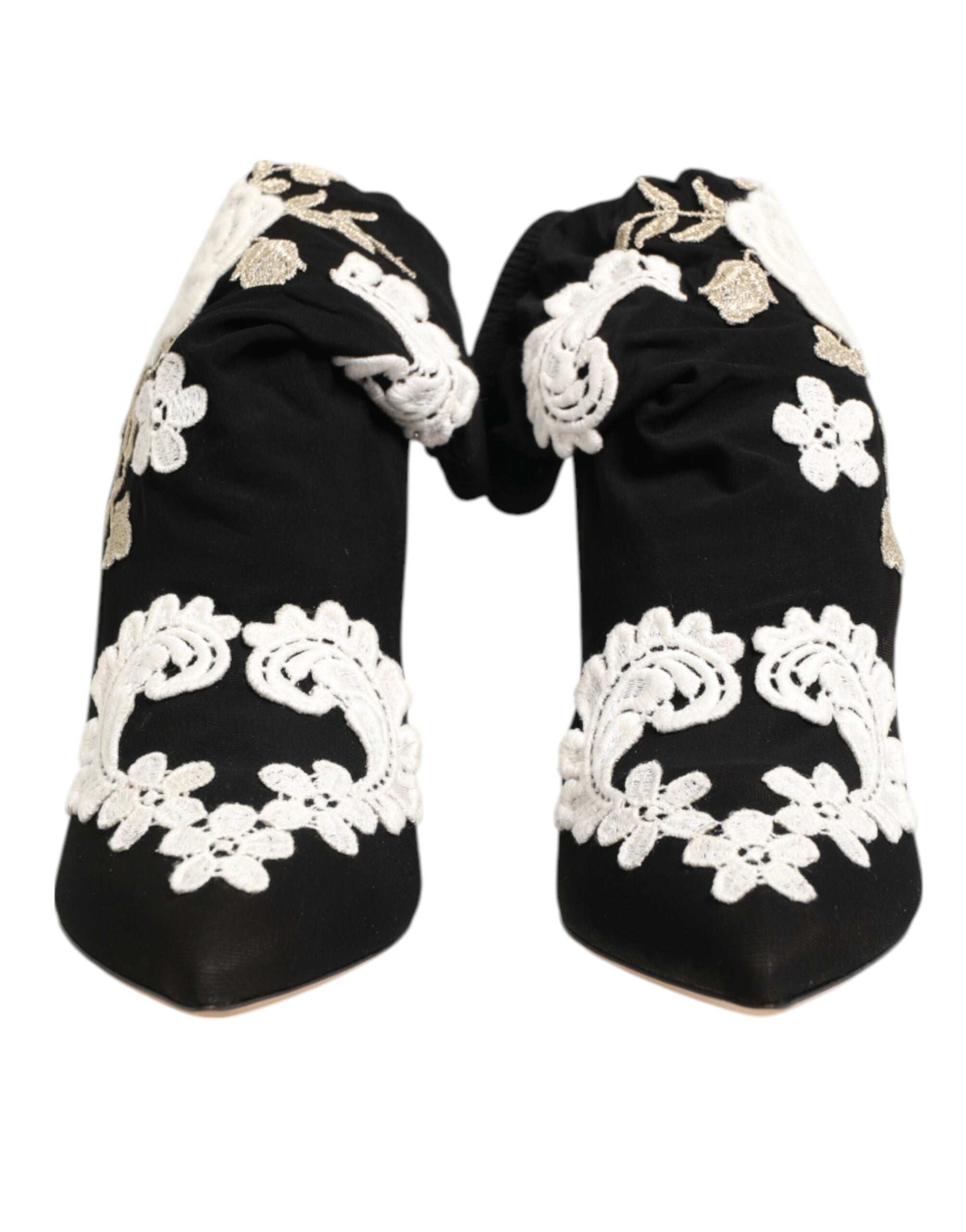 Step into elegance with Dolce & Gabbana's Black White Embroidered Jersey Stiletto Boots, where luxurious materials meet exquisite craftsmanship for a bold statement.