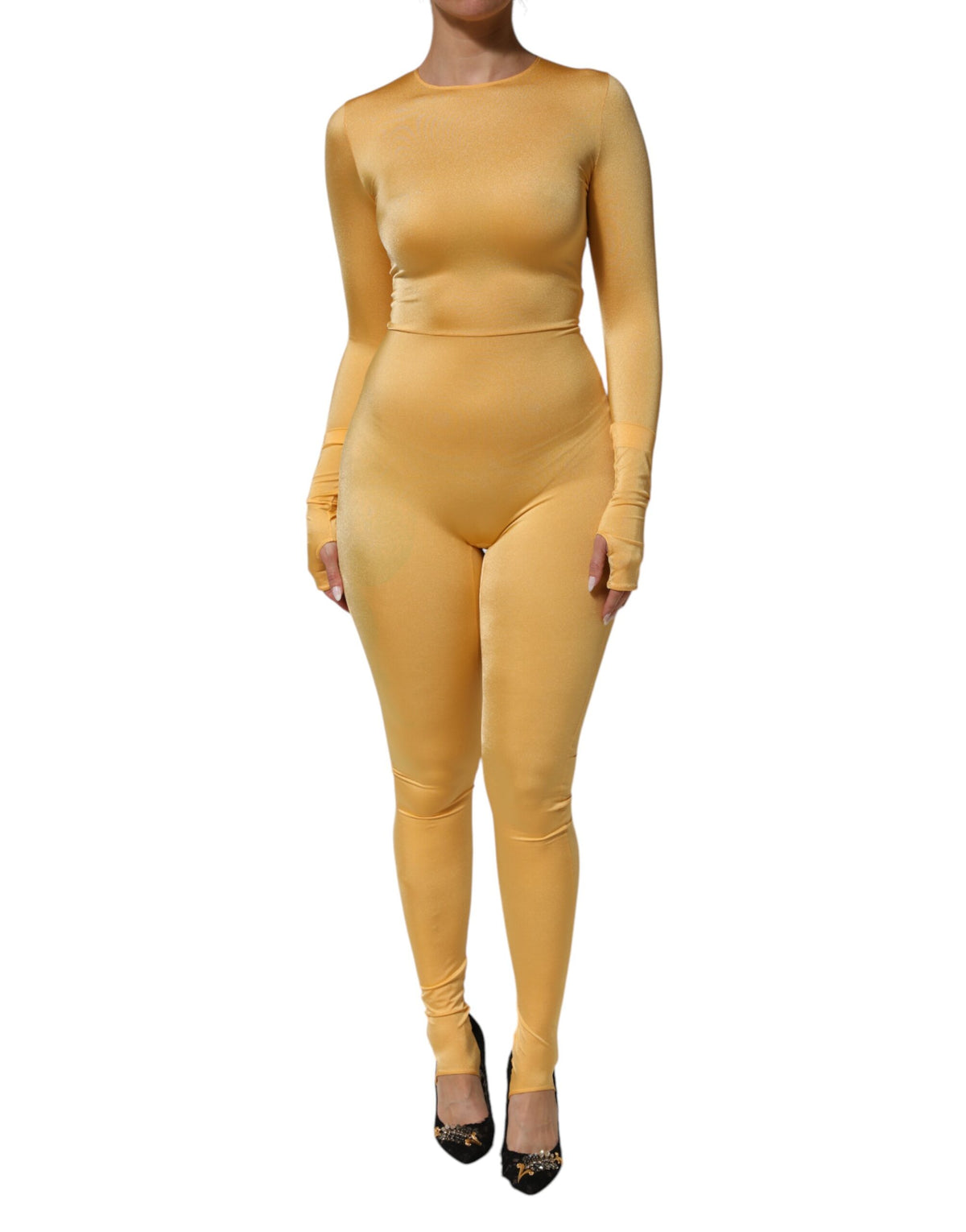 Indulge in the exquisite allure of the Dolce & Gabbana Gold Yellow Stretch Long Sleeve Bodysuit Dress, where Italian craftsmanship meets luxurious elegance, perfect for any occasion.