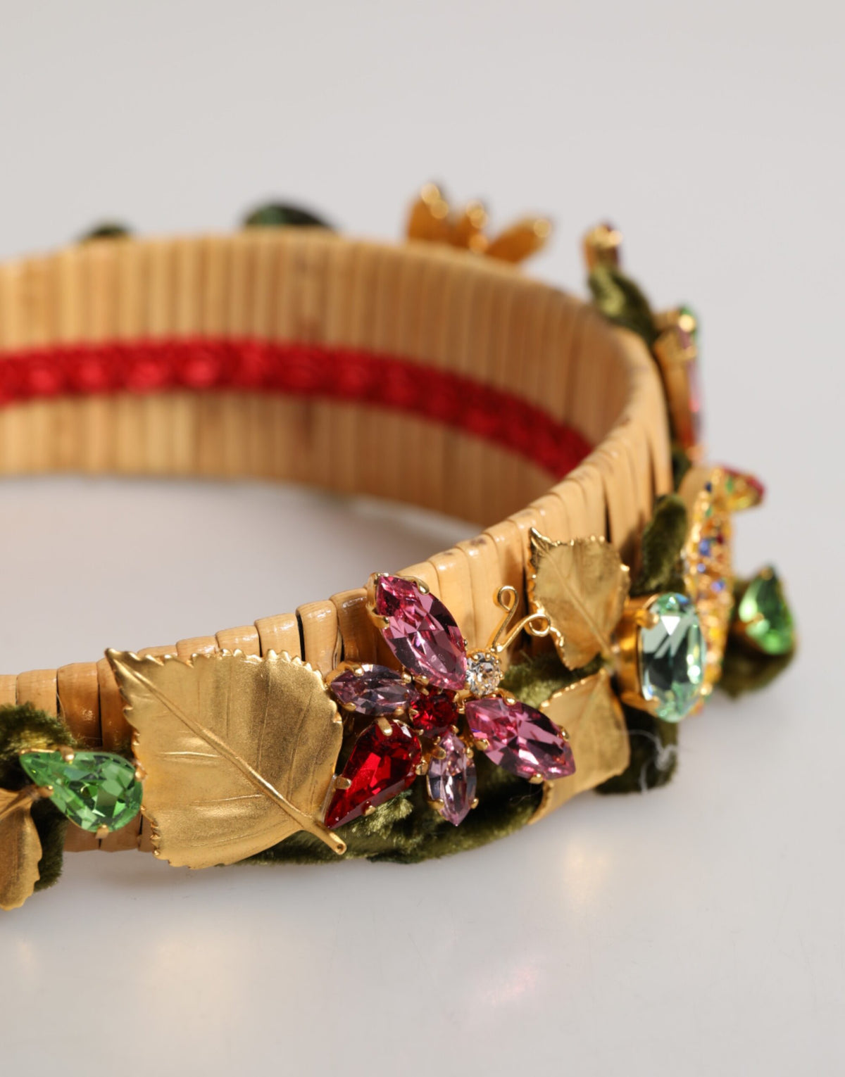 Indulge in the artistry of the Dolce & Gabbana Multicolor Crystal Floral Velvet Crown Headband, a luxurious statement piece that transforms any occasion into a celebration of elegance and individuality.