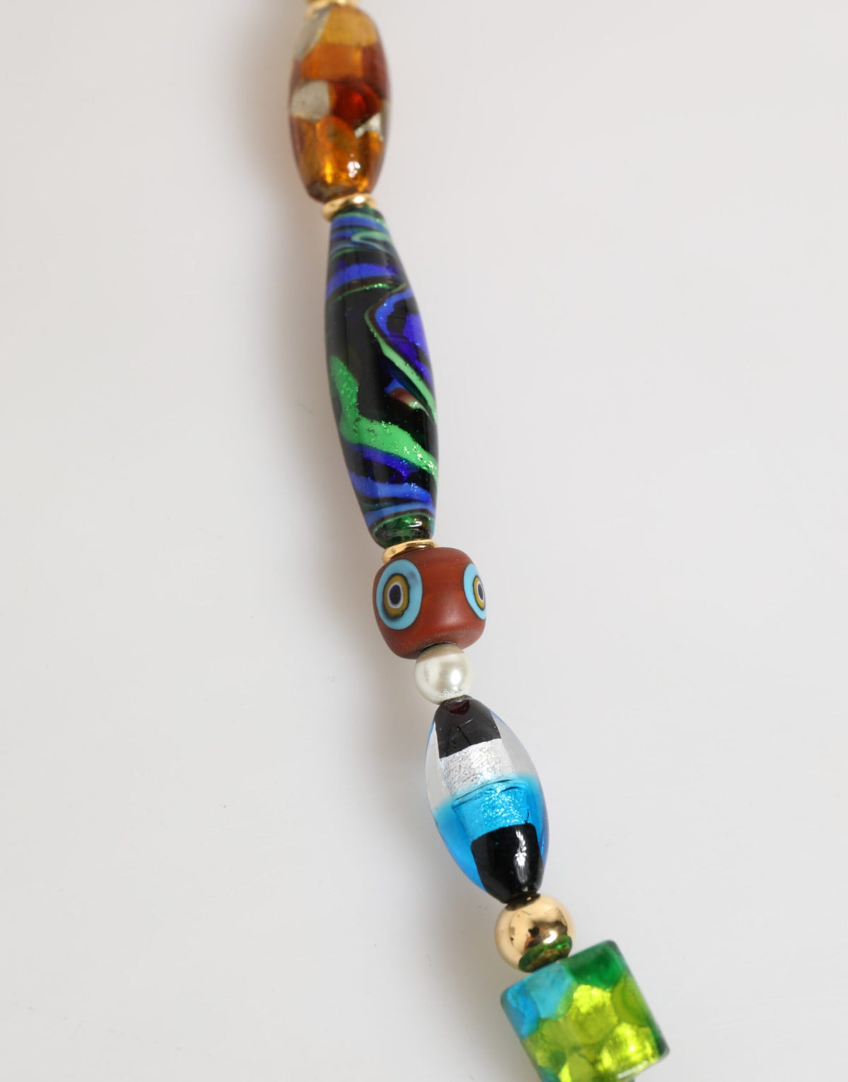 Indulge in the exquisite artistry of Dolce & Gabbana's Multicolor Murano Glass Beads Brass Necklace, a statement piece that embodies Italian elegance and sophistication.