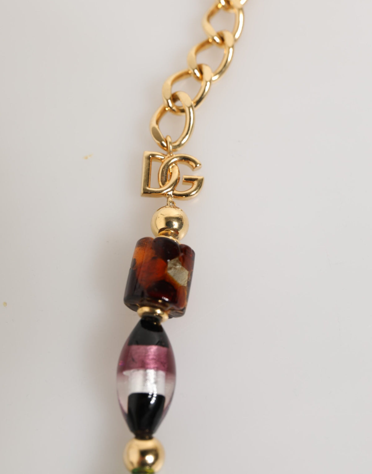 Indulge in the exquisite artistry of Dolce & Gabbana's Multicolor Murano Glass Beads Brass Necklace, a statement piece that embodies Italian elegance and sophistication.