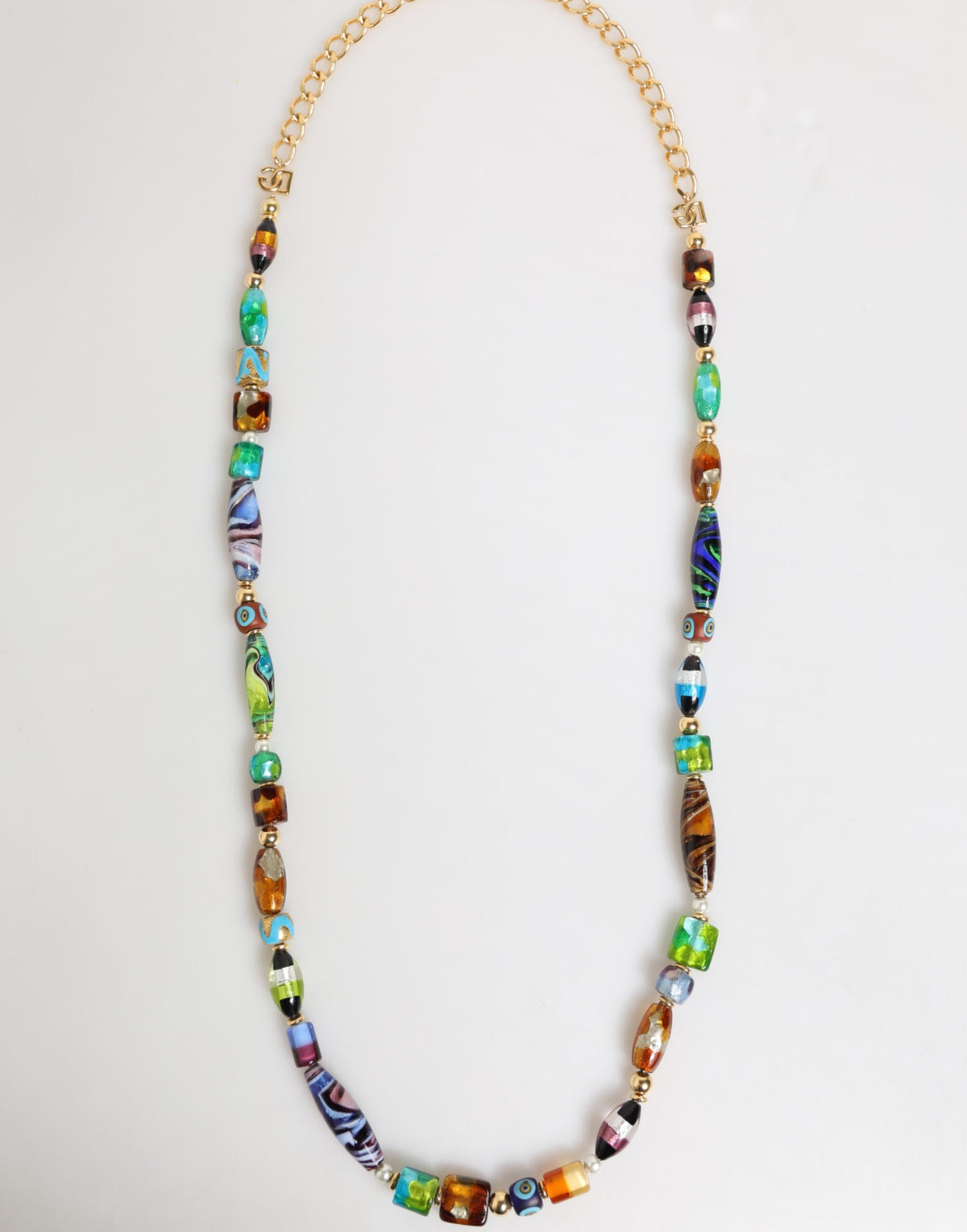 Indulge in the exquisite artistry of the Dolce & Gabbana Multicolor Murano Glass Beads Brass Necklace, a statement of Italian elegance that elevates every ensemble.