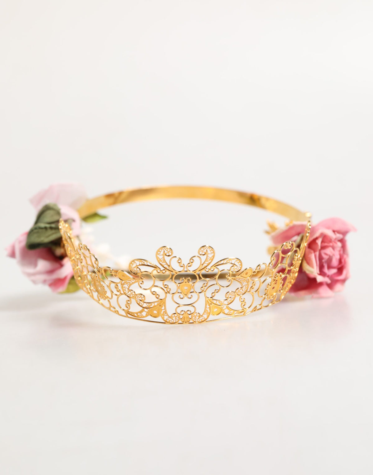 Elevate your elegance with the Dolce & Gabbana Gold Floral Tiara, a luxurious crown headband adorned with delicate fabric flowers and shimmering crystals, embodying haute couture sophistication.