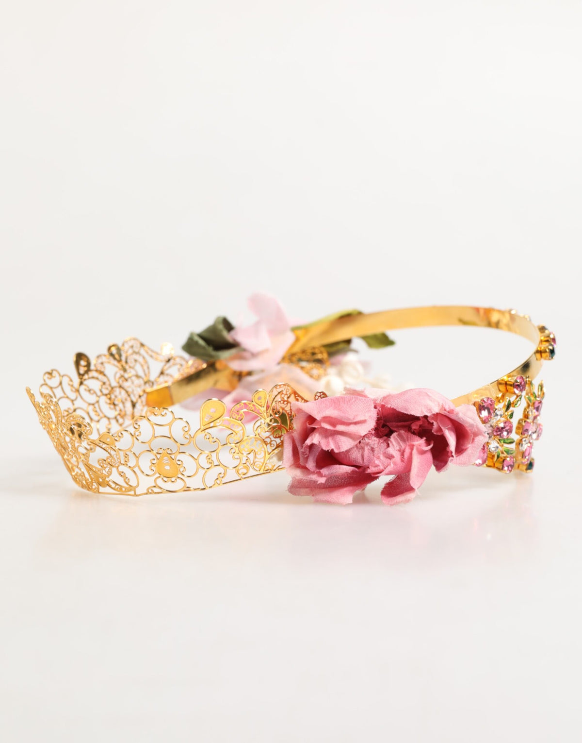 Elevate your elegance with the Dolce & Gabbana Gold Floral Tiara, a luxurious crown headband adorned with exquisite fabric flowers and shimmering crystals, embodying haute couture artistry.