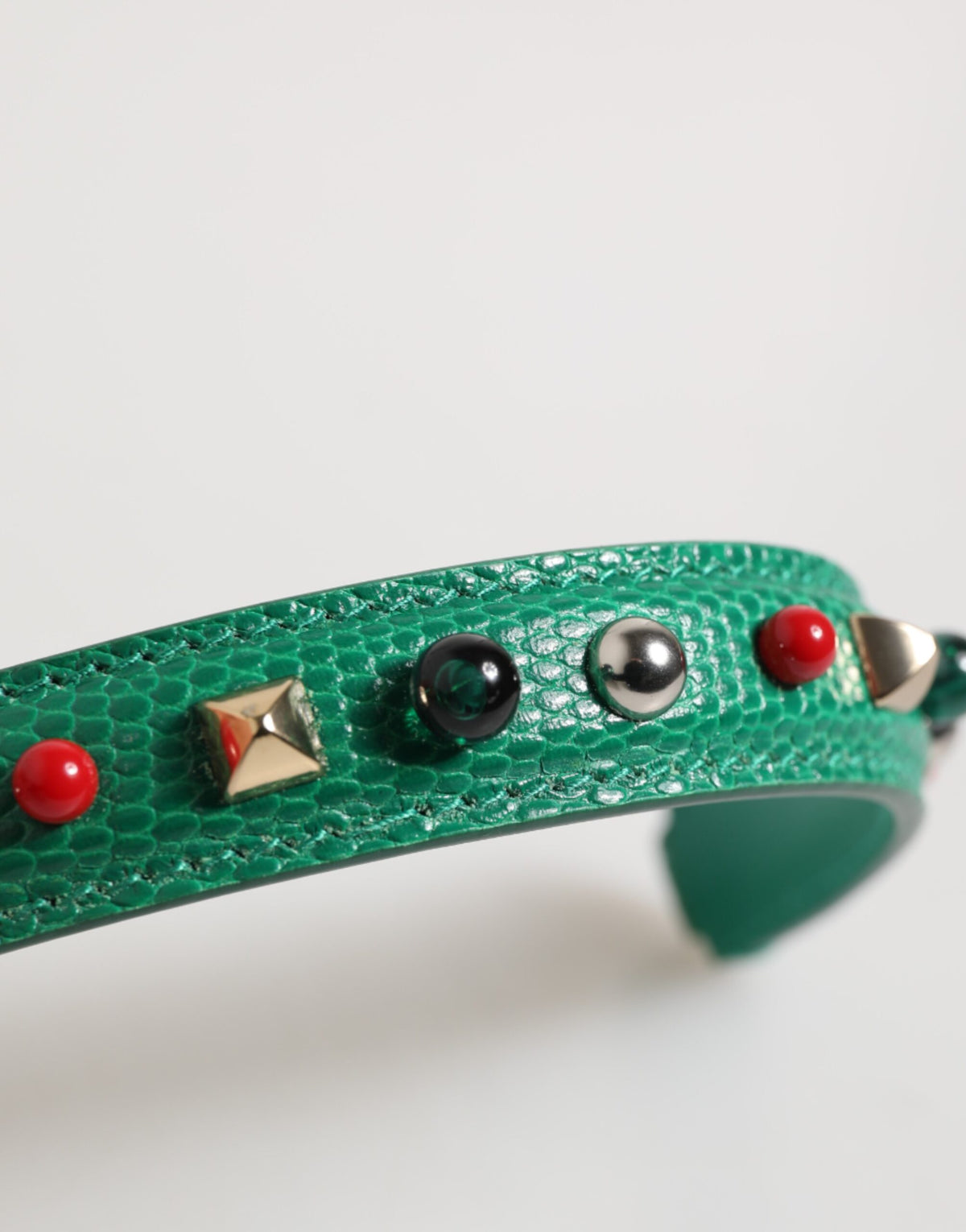 Indulge in the exquisite Dolce & Gabbana Green Embellished Leather Shoulder Strap, a masterpiece of Italian craftsmanship that elevates your style with opulent elegance.