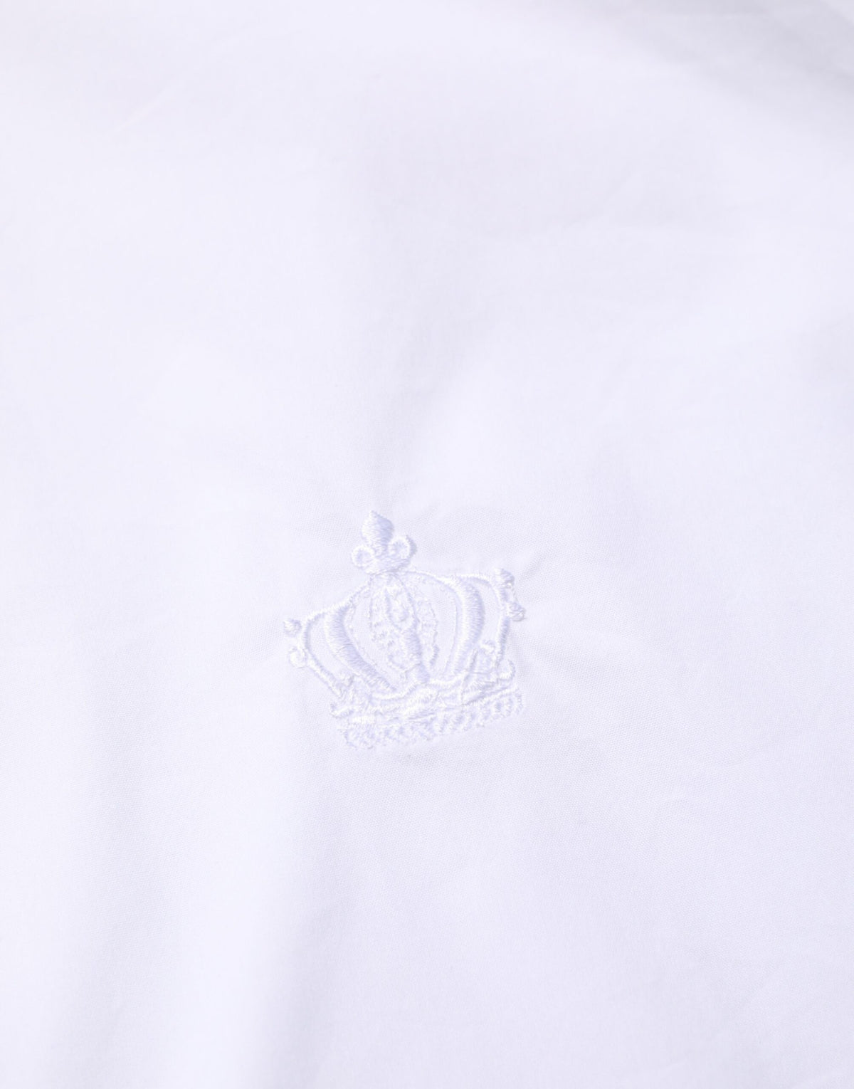 Experience the exquisite Dolce & Gabbana White Cotton MARTINI dress shirt, a blend of luxurious craftsmanship and timeless elegance, perfect for the discerning individual.