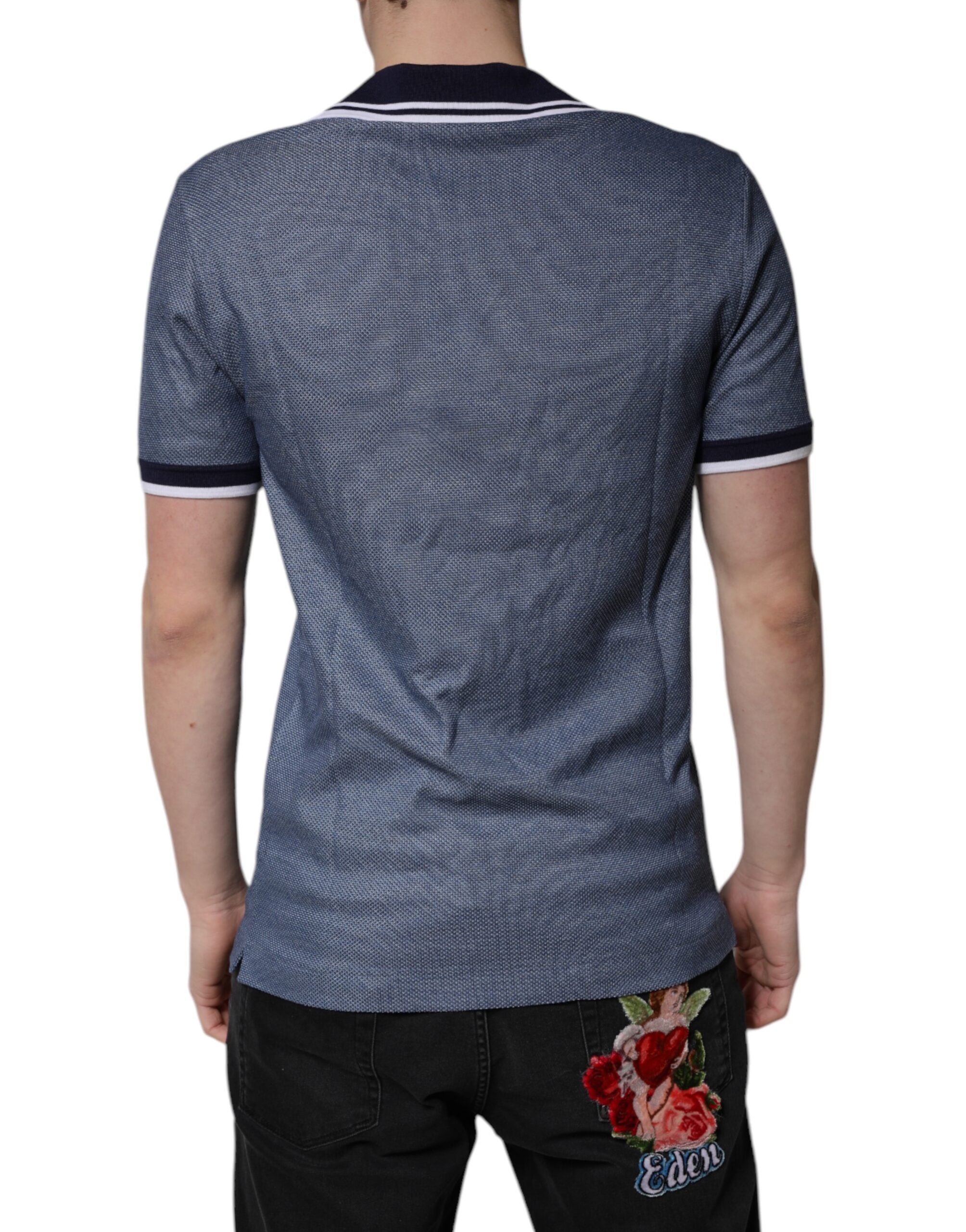 Elevate your wardrobe with the Dolce & Gabbana Blue Collared V-neck Silk Blend Polo T-shirt, a testament to Italian craftsmanship and timeless elegance, perfect for any discerning individual.