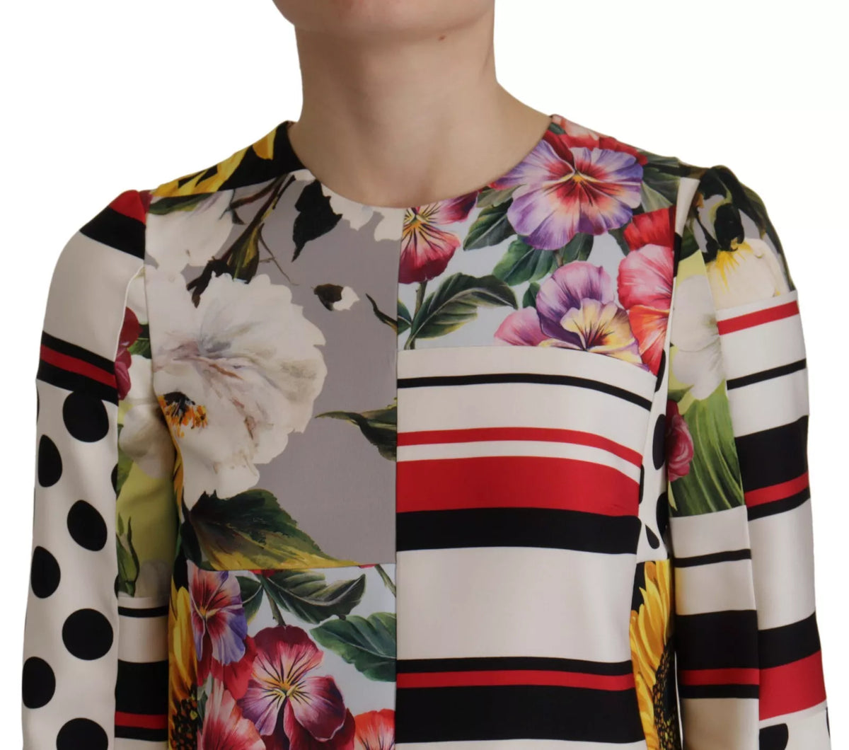 Indulge in the exquisite Dolce & Gabbana Multicolor Patchwork Charmeuse Floral Shift Dress, a luxurious blend of silk and elastane that embodies sensual elegance and Italian artistry.