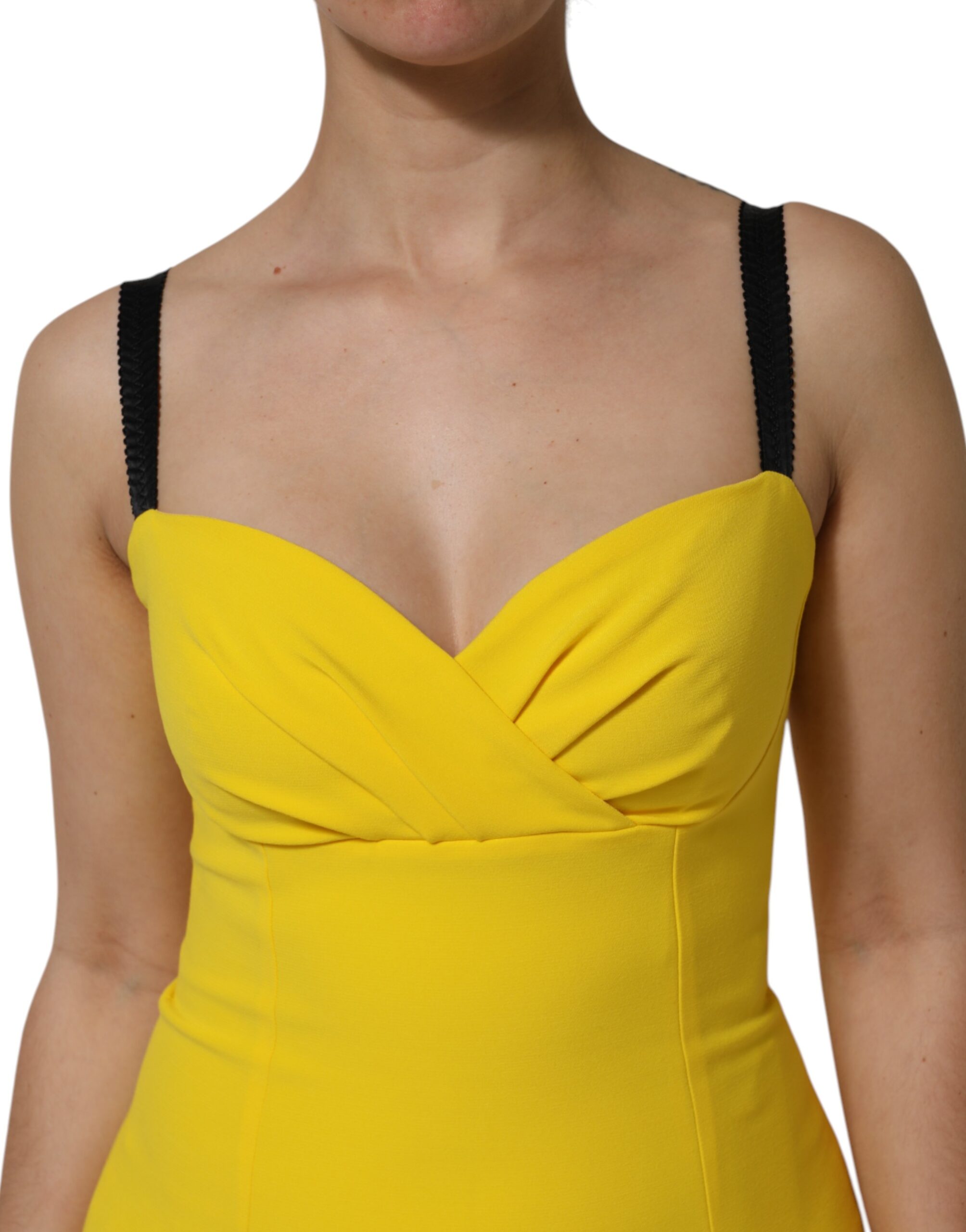 Elevate your wardrobe with the Dolce & Gabbana Yellow Sleeveless Sheath Midi Dress, a masterpiece of Italian craftsmanship that embodies elegance and sophistication for the discerning individual.