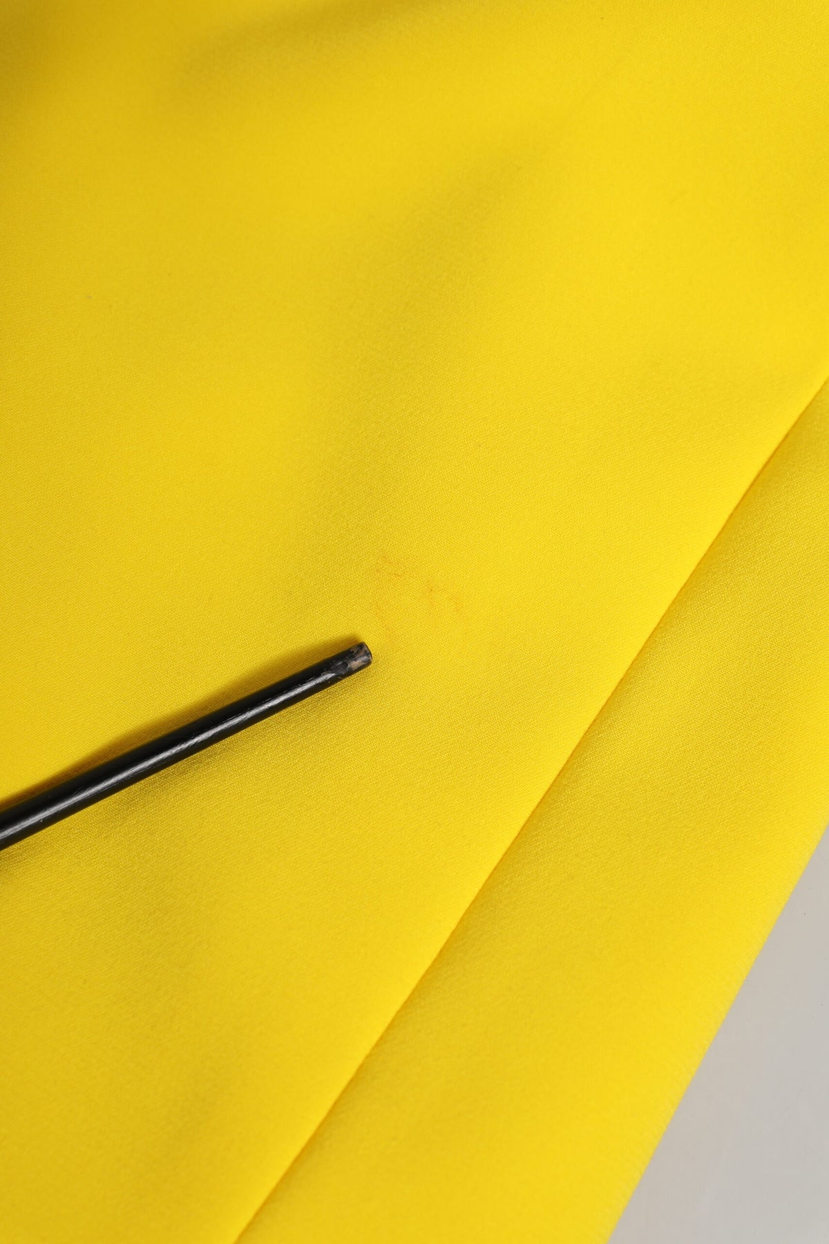 Experience the allure of Dolce & Gabbana's Yellow Polyester Sleeveless Sheath Midi Dress, where exquisite craftsmanship meets luxurious elegance, perfect for any occasion.