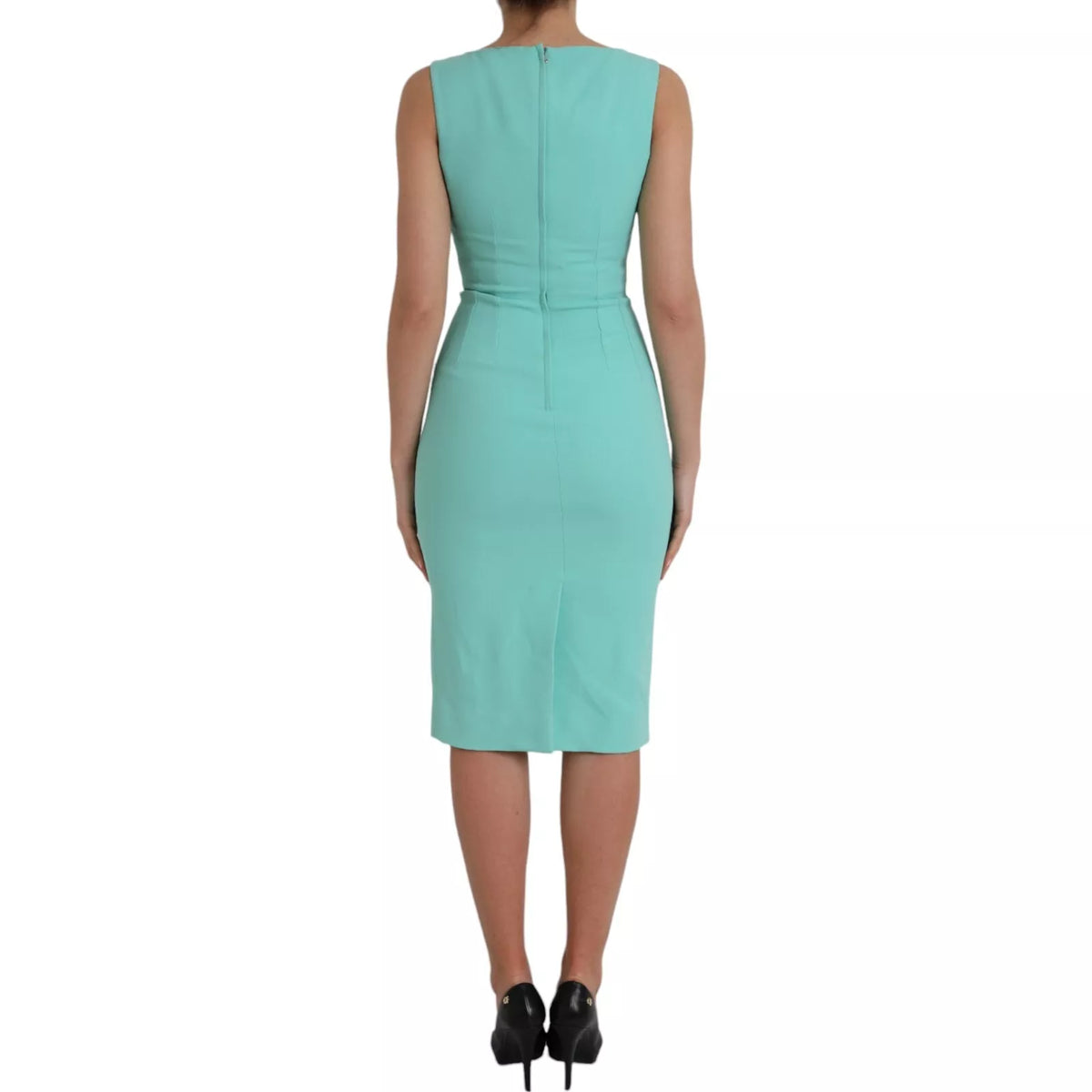 Indulge in the allure of the Dolce & Gabbana Green Viscose Sleeveless Sheath Midi Dress, a masterpiece of Italian craftsmanship that epitomizes elegance and sophistication.