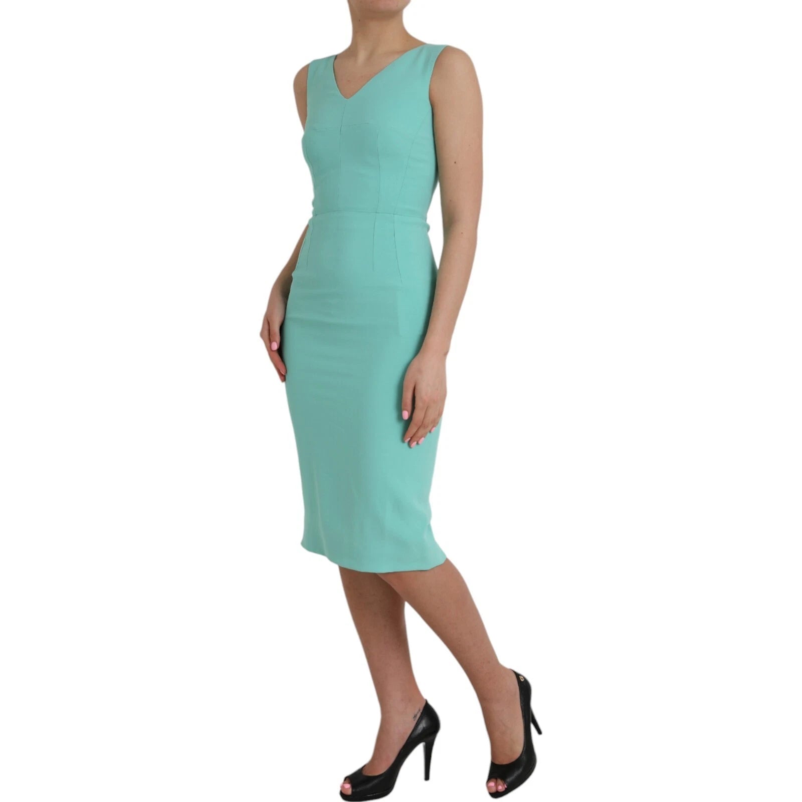 Indulge in the Dolce & Gabbana Green Viscose Sleeveless Sheath Midi Dress, a masterpiece of Italian craftsmanship that embodies elegance and sophistication for the discerning individual.