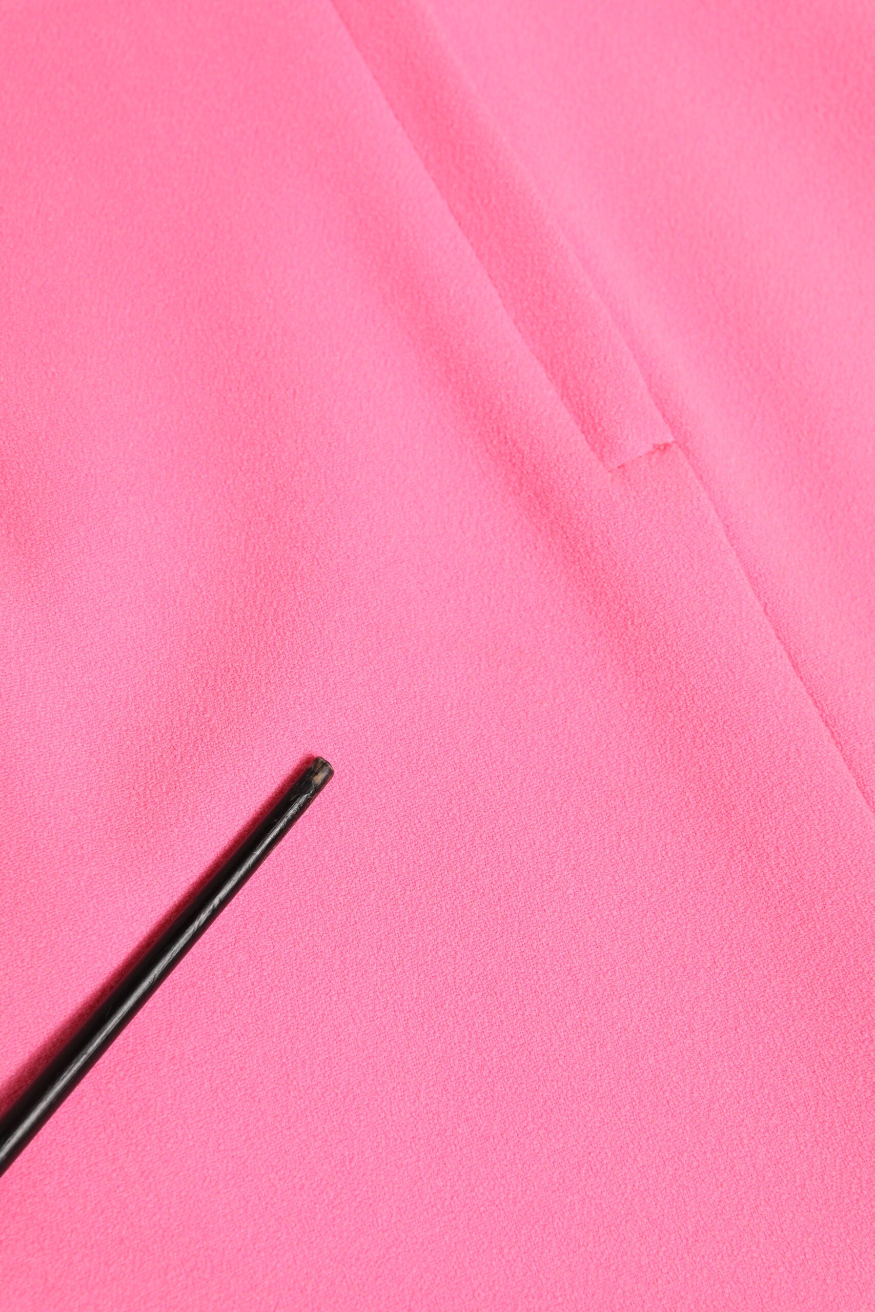 Experience the allure of the Dolce & Gabbana Pink Polyester Long Sleeves Sheath Midi Dress, a masterpiece of Italian craftsmanship that embodies timeless elegance and sophistication.