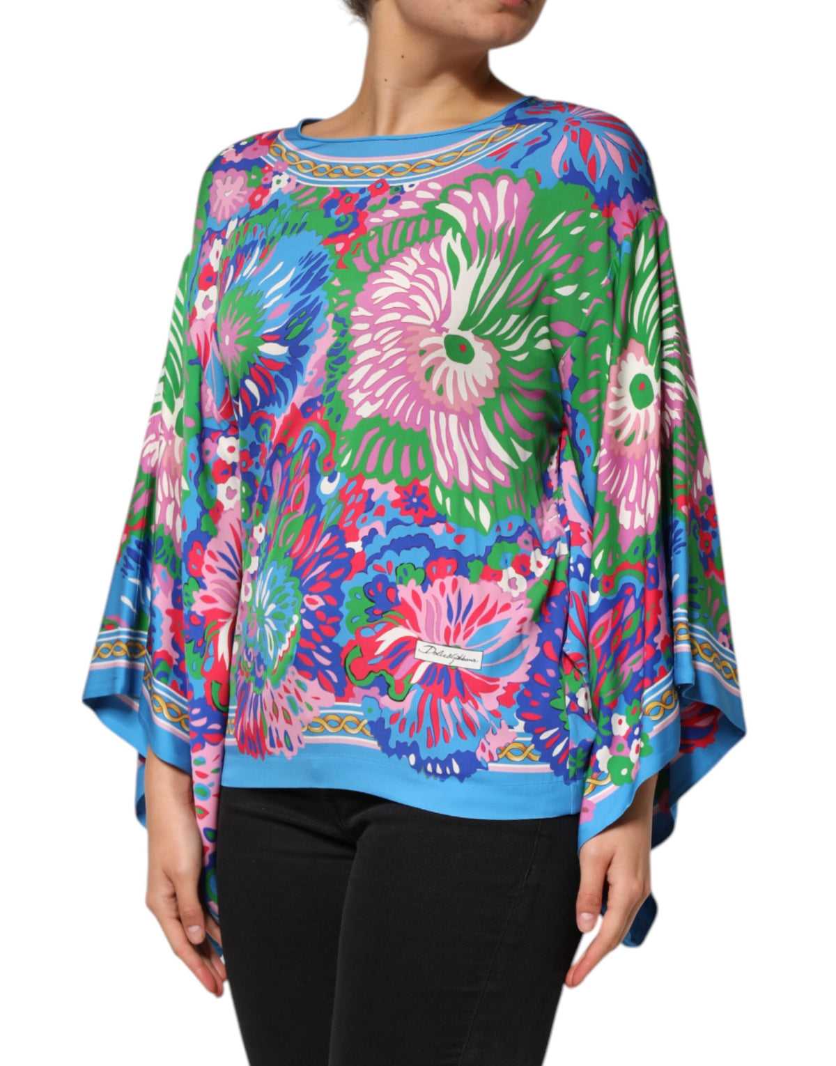 Elevate your wardrobe with the Dolce & Gabbana Multicolor Floral Print Silk Blouse, a luxurious blend of silk and elastane, embodying Italian elegance and exquisite craftsmanship.