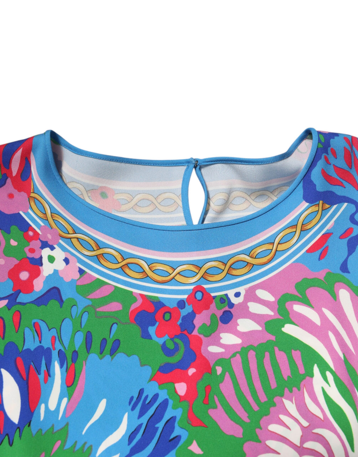 Elevate your wardrobe with the Dolce & Gabbana Multicolor Floral Print Silk Tunic Blouse, a masterpiece of Italian craftsmanship, blending sensuality and elegance for any occasion.