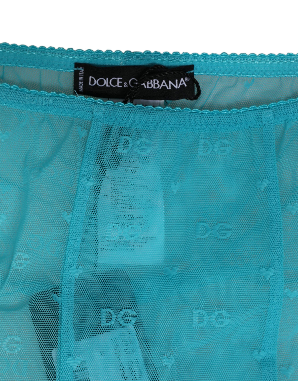Elevate your wardrobe with Dolce & Gabbana's Light Blue Nylon Logo Lace Leggings, a masterpiece of Italian craftsmanship that embodies sensual elegance and timeless allure.