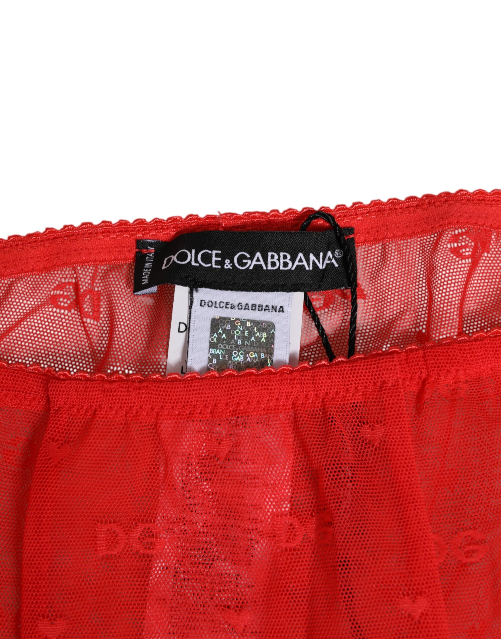Indulge in the exquisite allure of Dolce & Gabbana's Red Nylon Logo Lace Leggings, crafted in Italy for a luxurious fit that embodies confidence and sensuality.