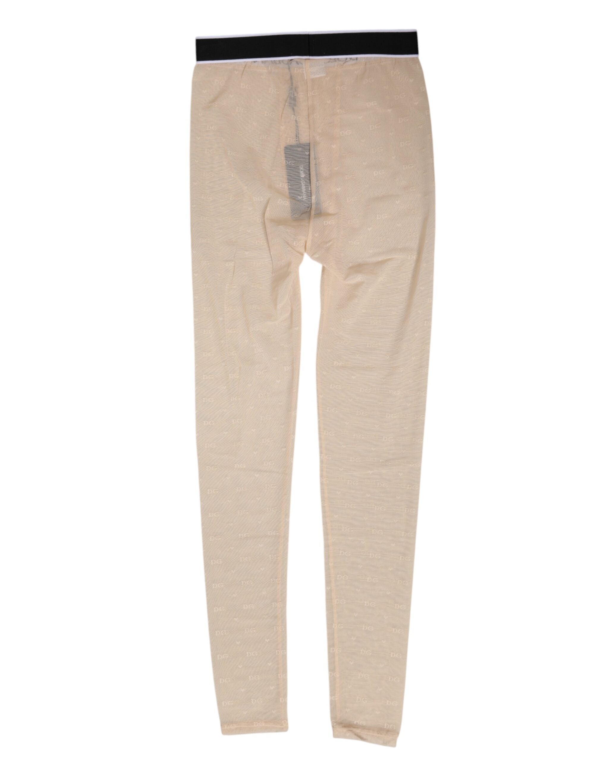 Indulge in the exquisite Dolce & Gabbana Beige Nylon Logo Lace Leggings, where luxurious craftsmanship meets sensual elegance, perfect for the discerning individual.